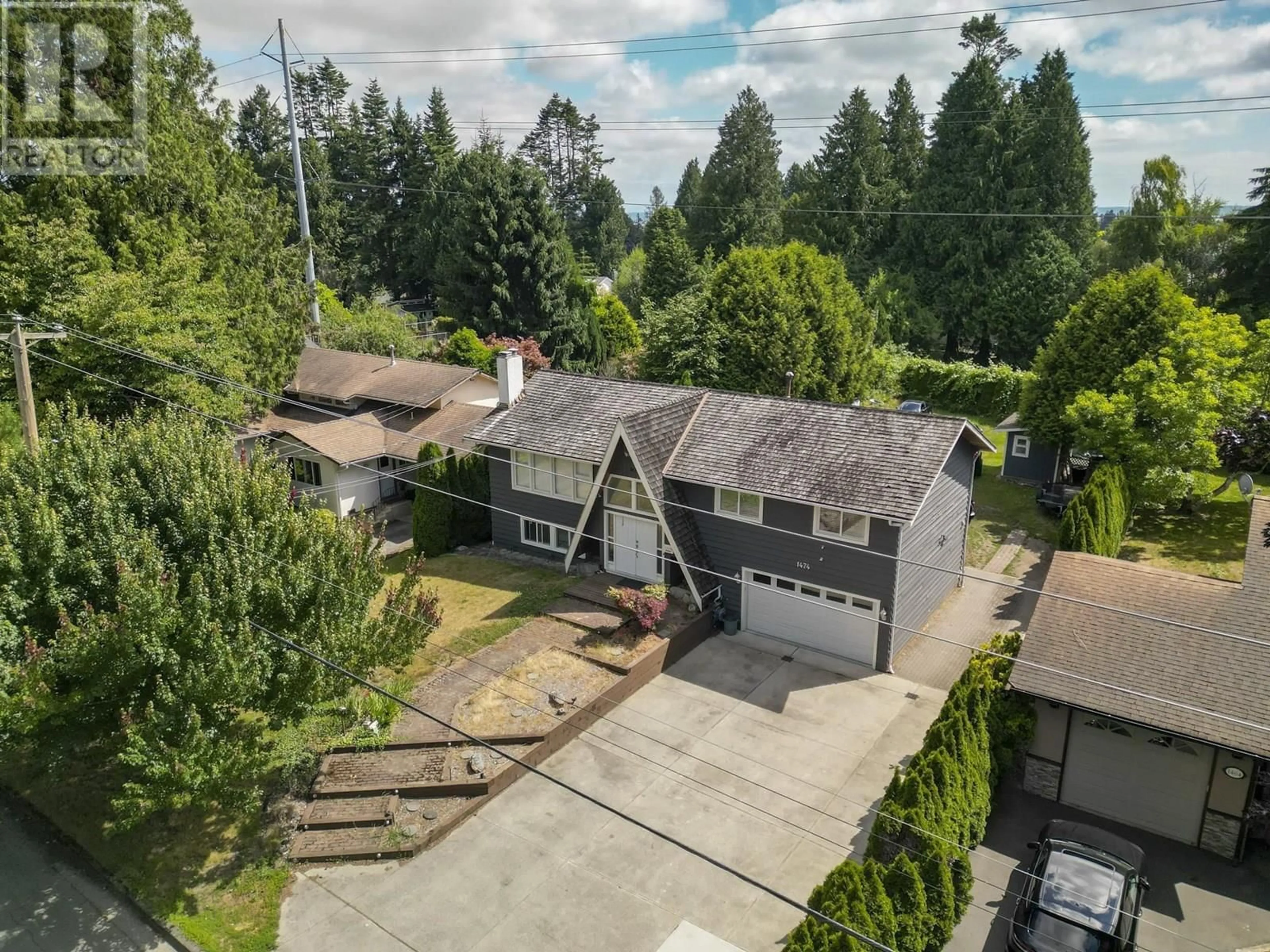A pic from outside/outdoor area/front of a property/back of a property/a pic from drone, street for 1474 53A STREET, Delta British Columbia V4M3E6
