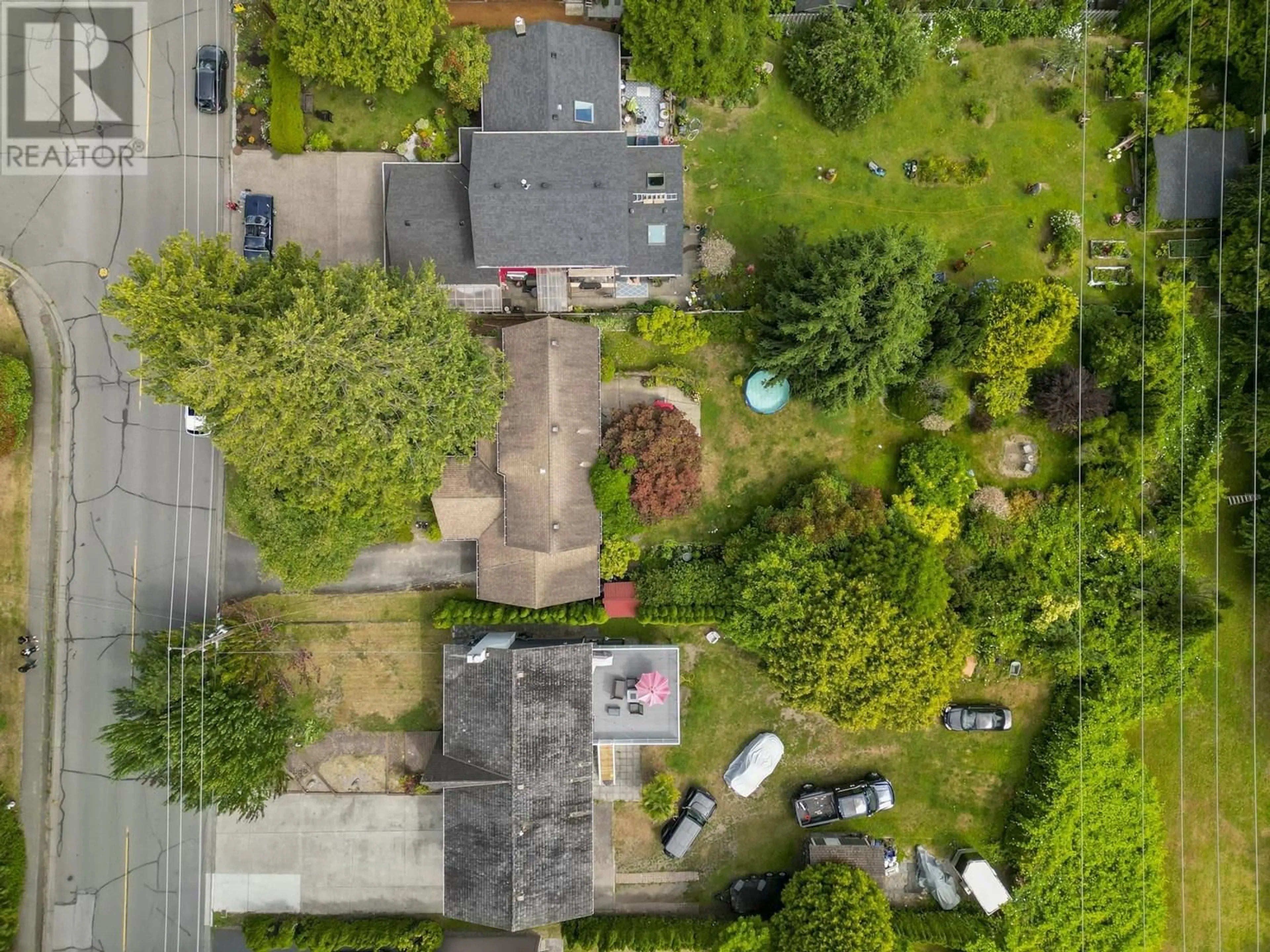 A pic from outside/outdoor area/front of a property/back of a property/a pic from drone, street for 1474 53A STREET, Delta British Columbia V4M3E6