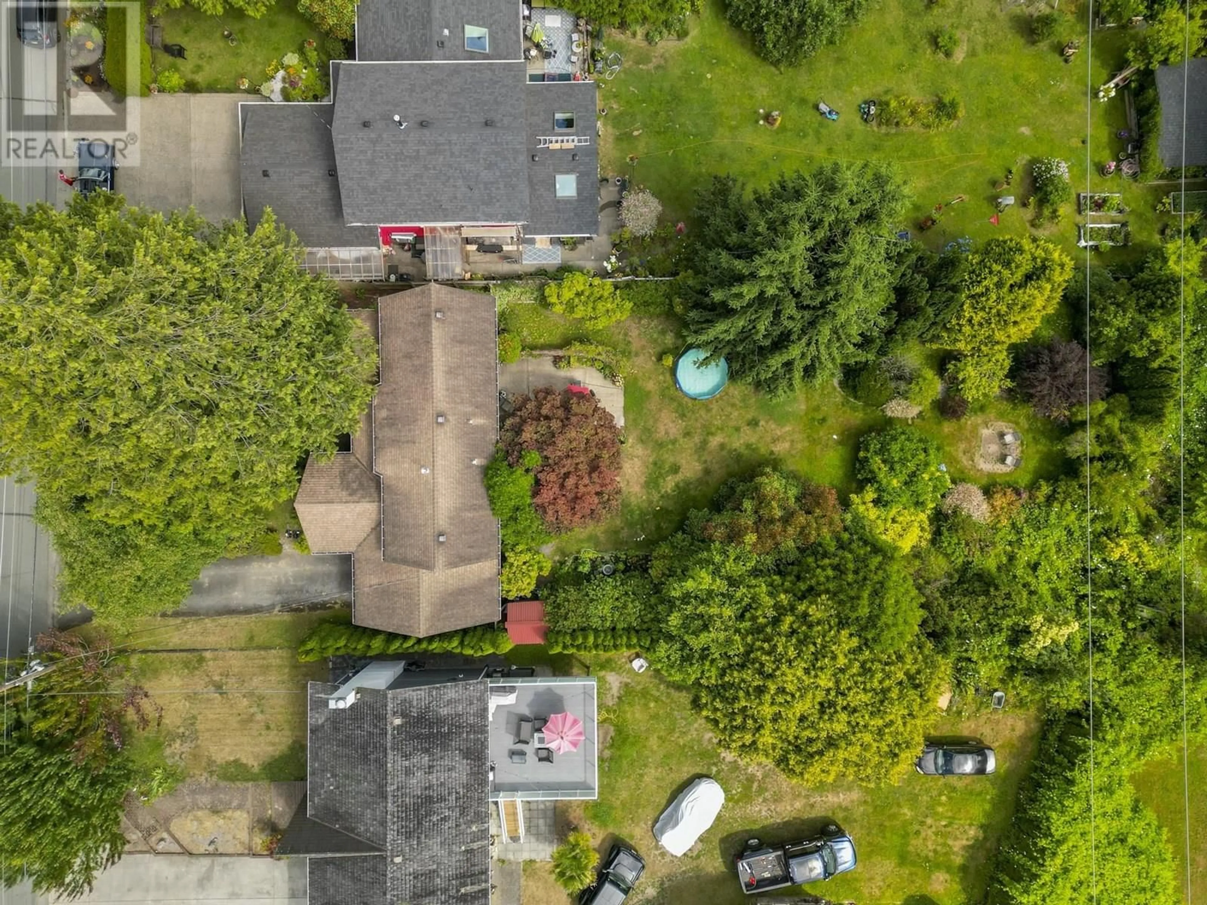 A pic from outside/outdoor area/front of a property/back of a property/a pic from drone, street for 1484 53A STREET, Delta British Columbia V4M3E6