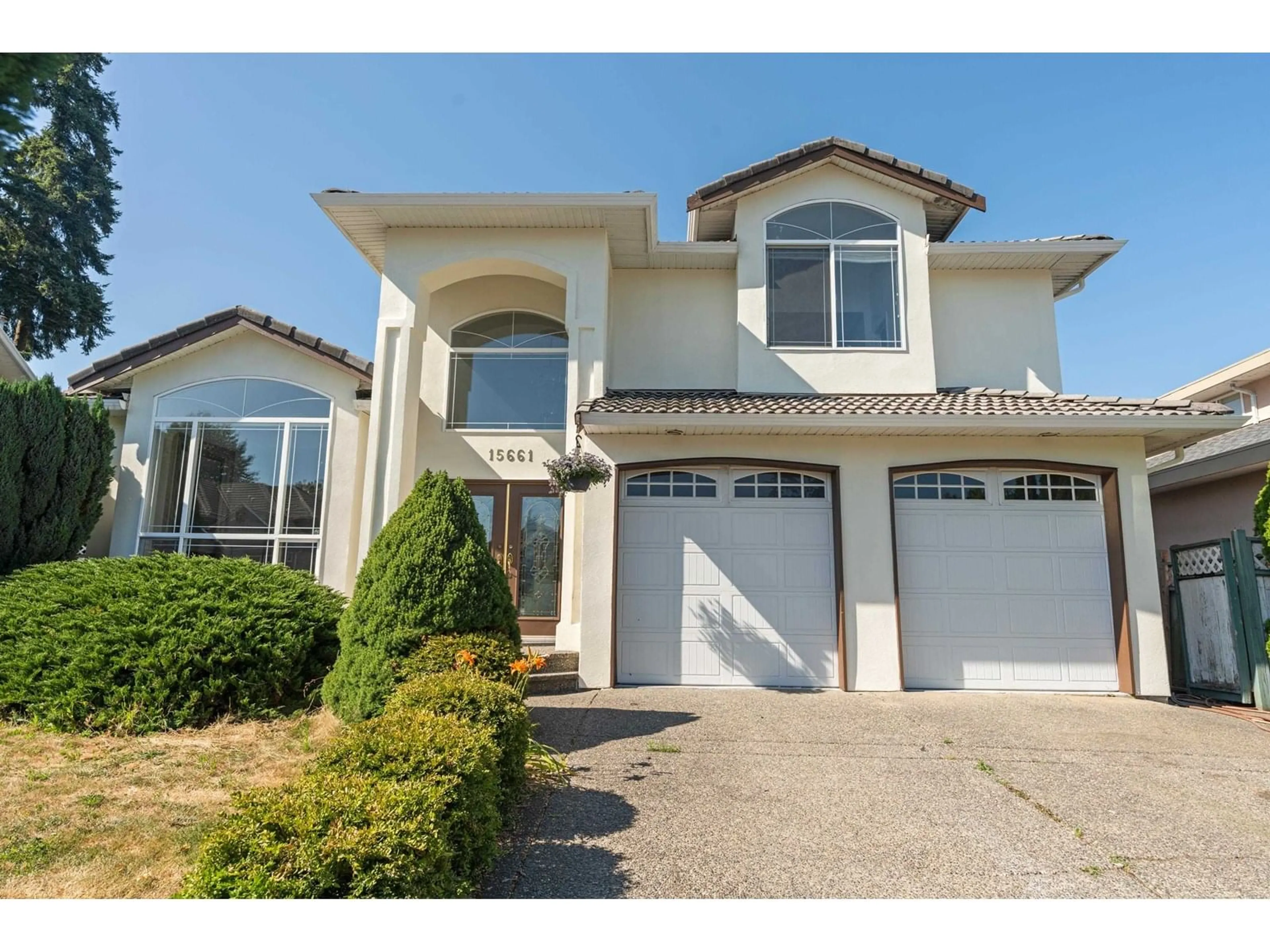 Home with vinyl exterior material, street for 15661 82A, Surrey British Columbia V4N0S3