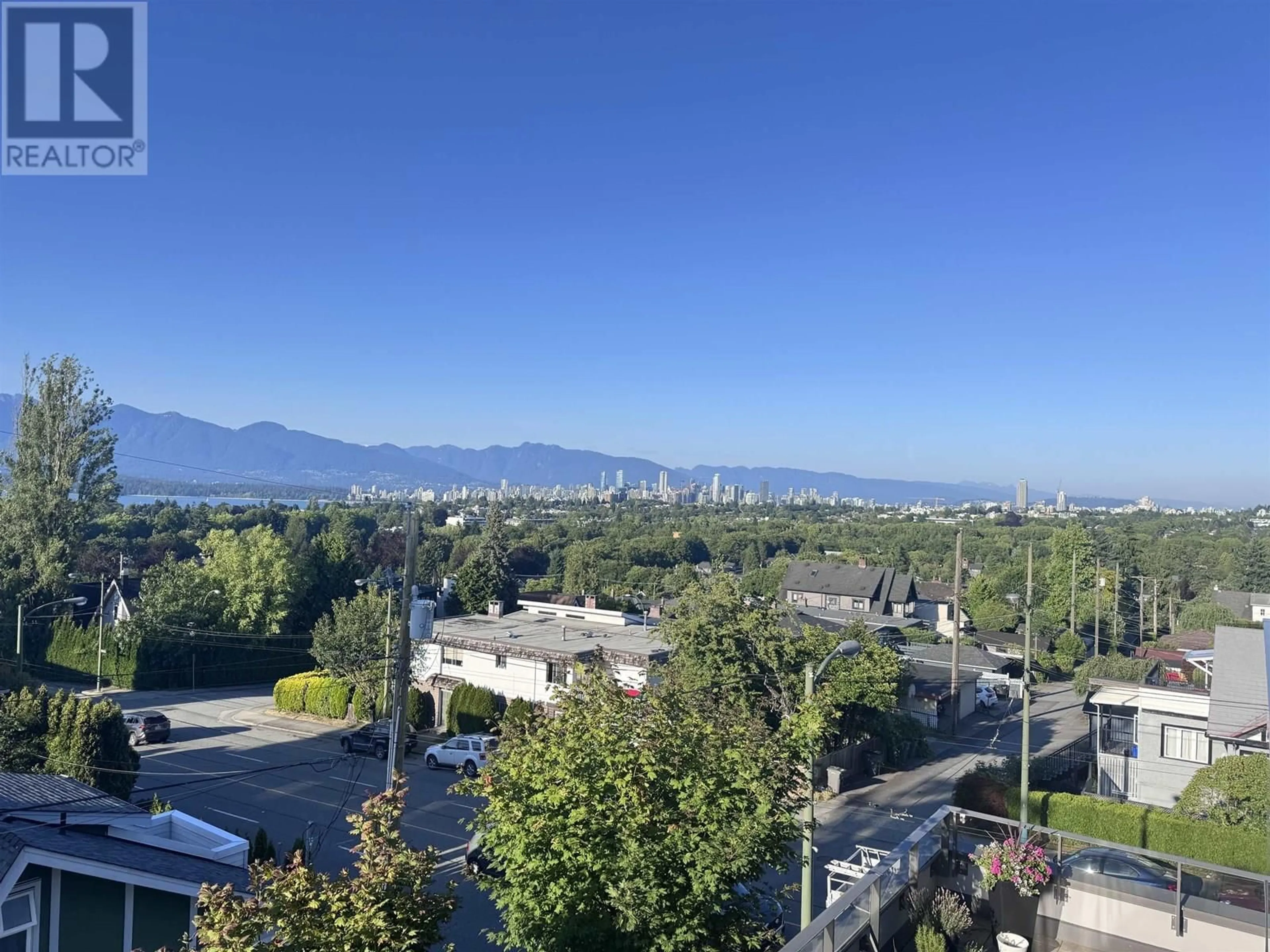 A pic from outside/outdoor area/front of a property/back of a property/a pic from drone, mountain view for 305 - 3639 16TH AVENUE, Vancouver British Columbia V6R3C3