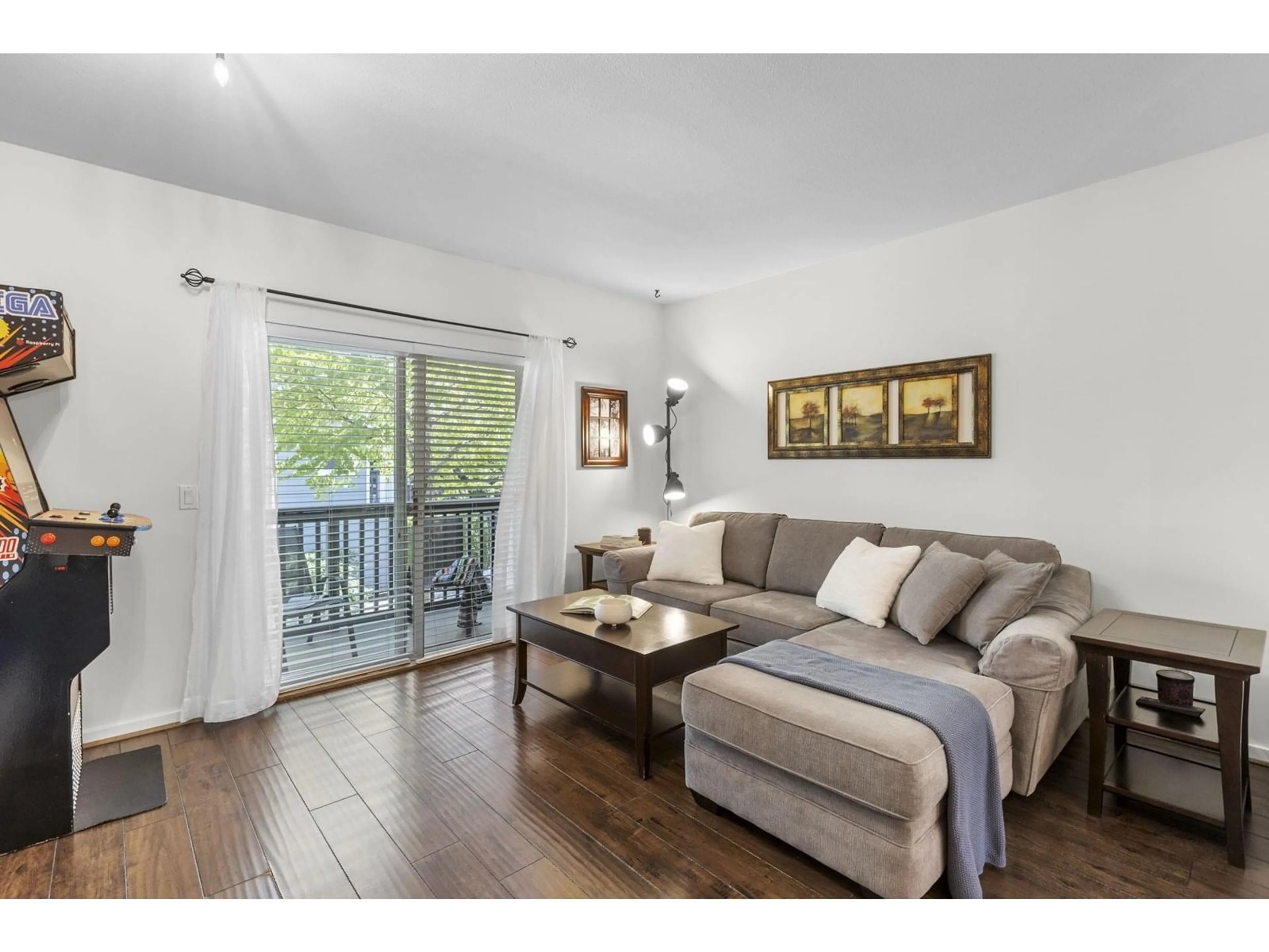 Living room with furniture, wood/laminate floor for 95 - 15236 36, Surrey British Columbia V3Z2B3