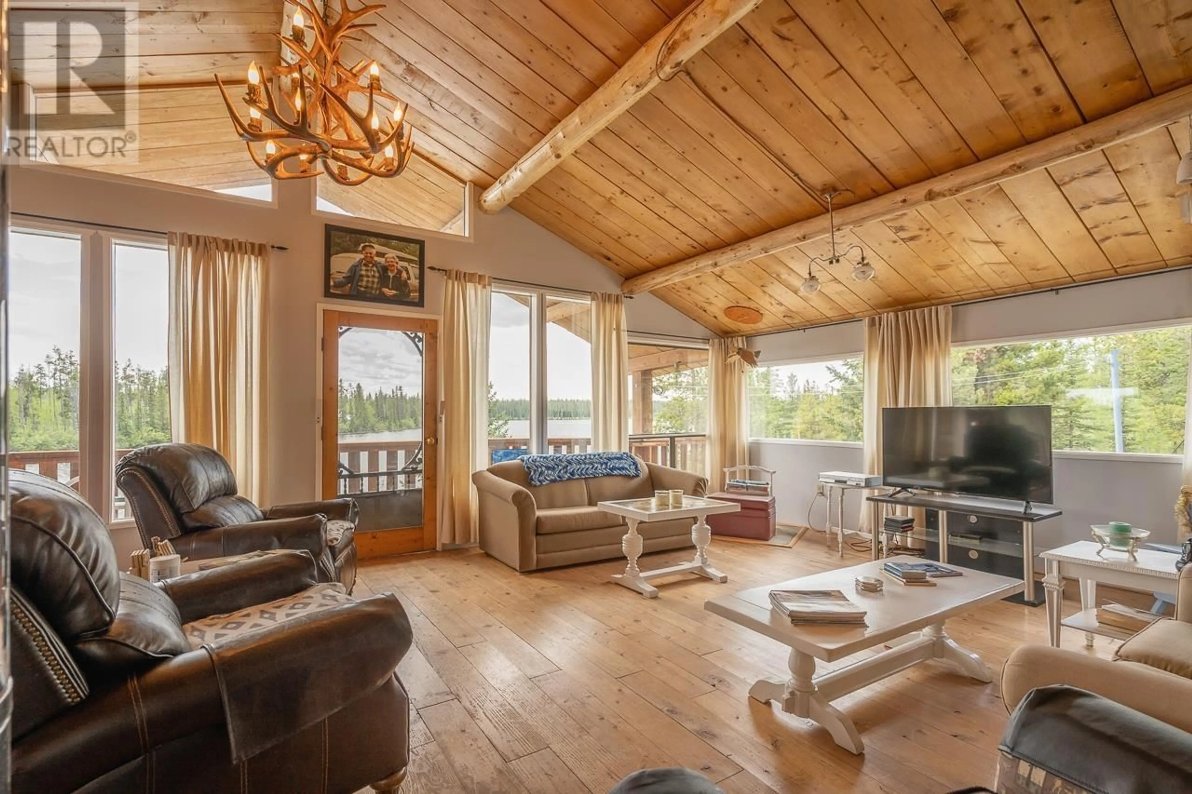 Living room with furniture, wood/laminate floor for Block C DL 8526 SCUM LAKE, Chilcotin British Columbia V0L1K0
