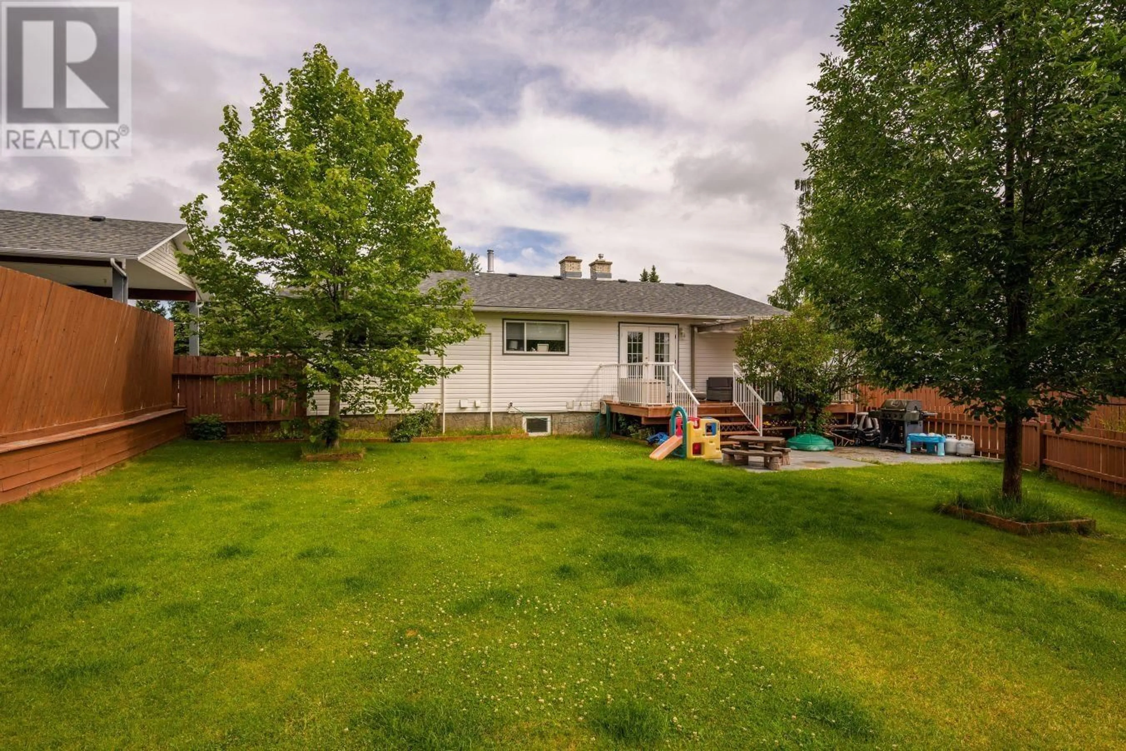 A pic from outside/outdoor area/front of a property/back of a property/a pic from drone, unknown for 4747 CROCUS CRESCENT, Prince George British Columbia V2K3H7