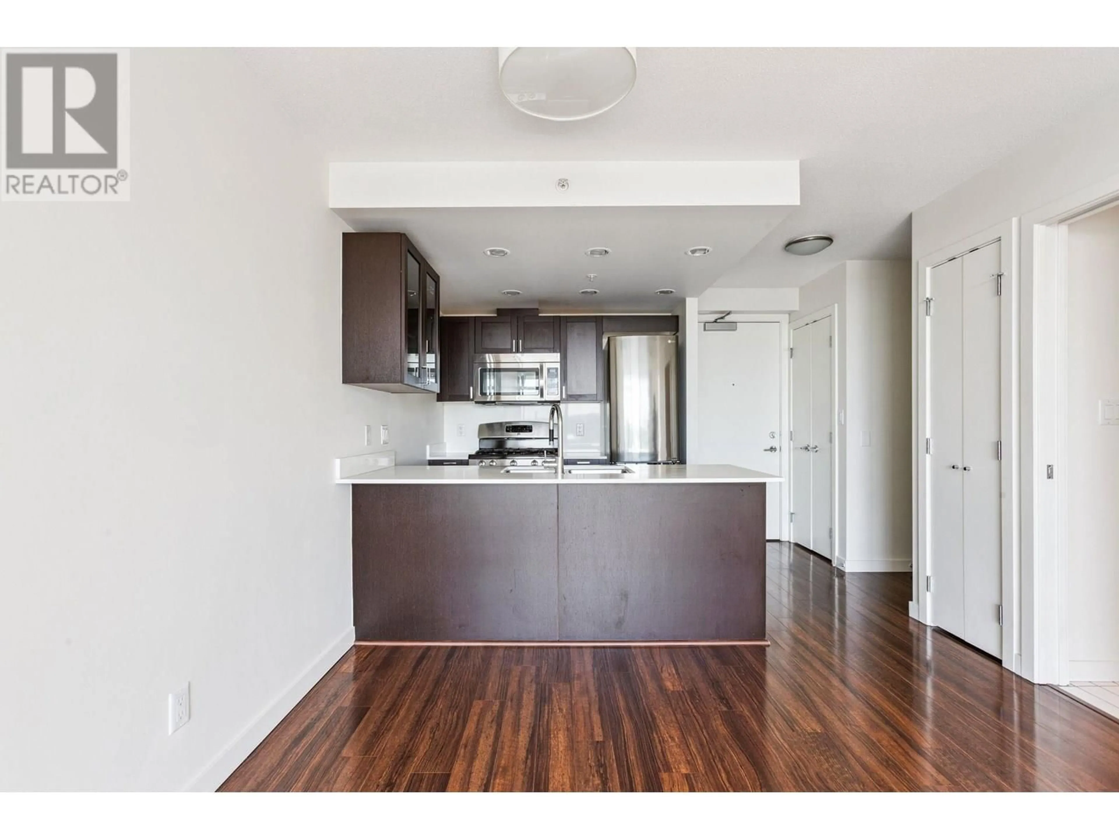 Open concept kitchen, wood/laminate floor for 1205 - 4815 ELDORADO MEWS, Vancouver British Columbia V5R0B2