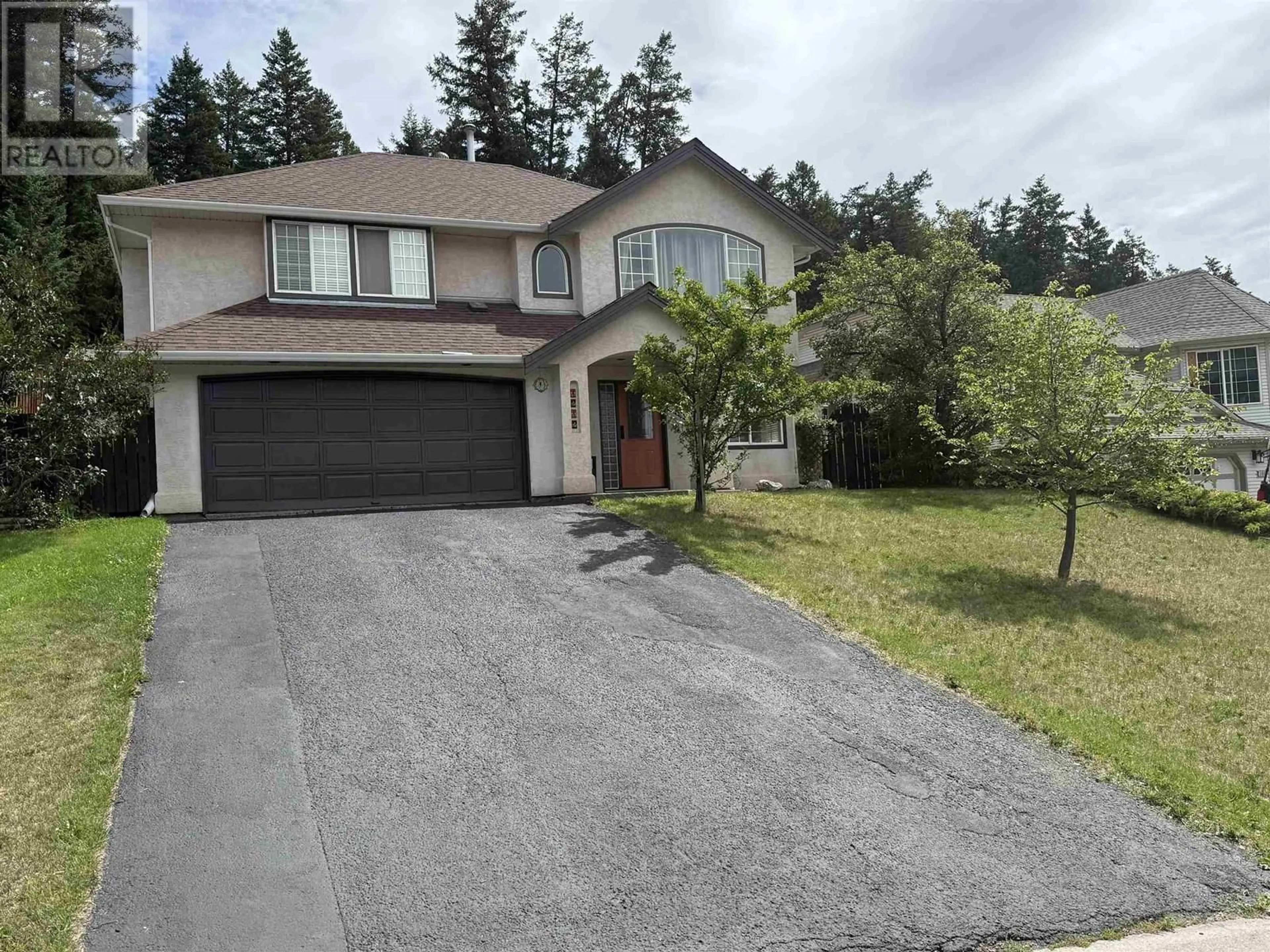 Home with vinyl exterior material, street for 1212 MIDNIGHT DRIVE, Williams Lake British Columbia V2G5K7