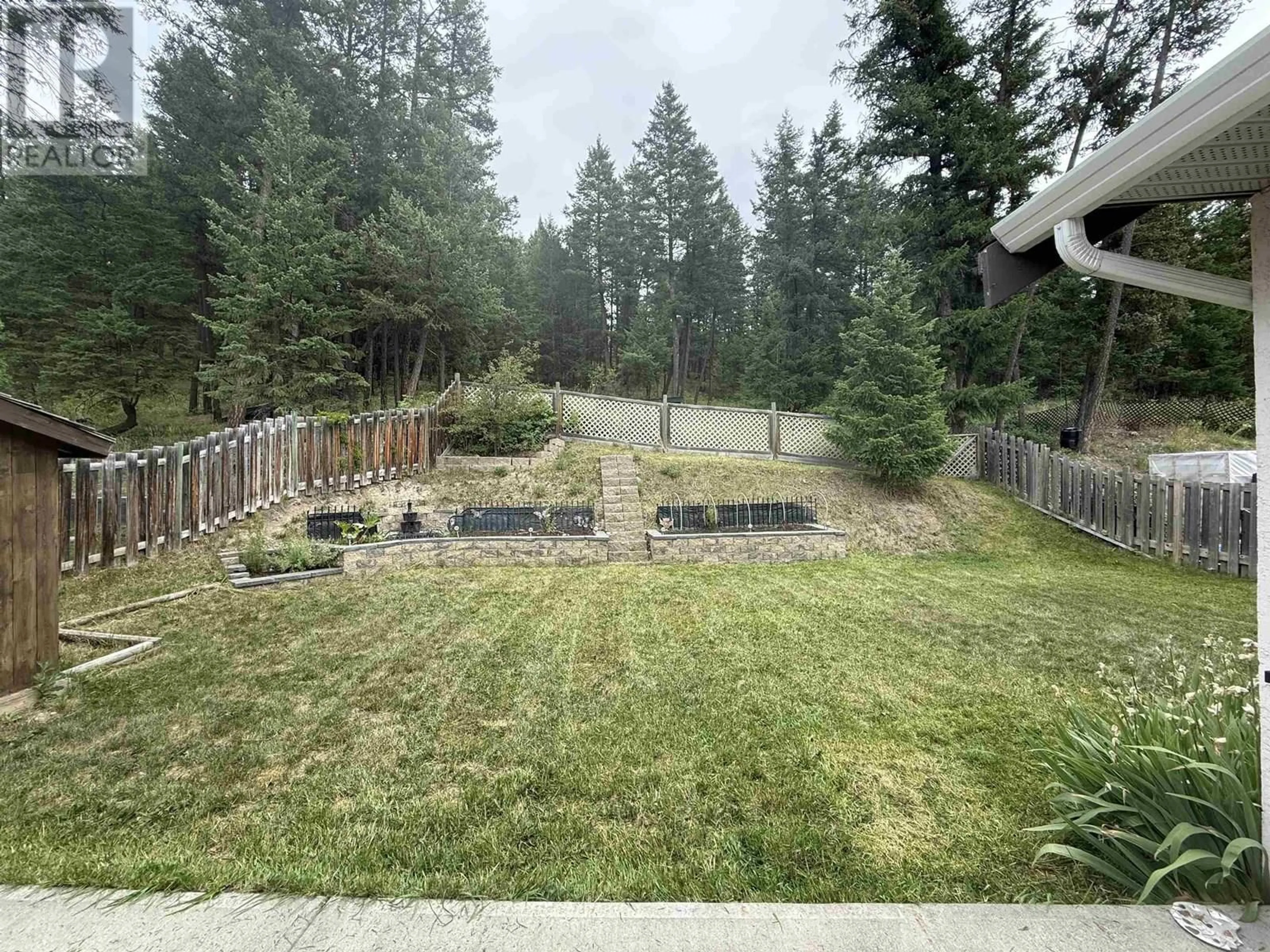A pic from outside/outdoor area/front of a property/back of a property/a pic from drone, forest/trees view for 1212 MIDNIGHT DRIVE, Williams Lake British Columbia V2G5K7