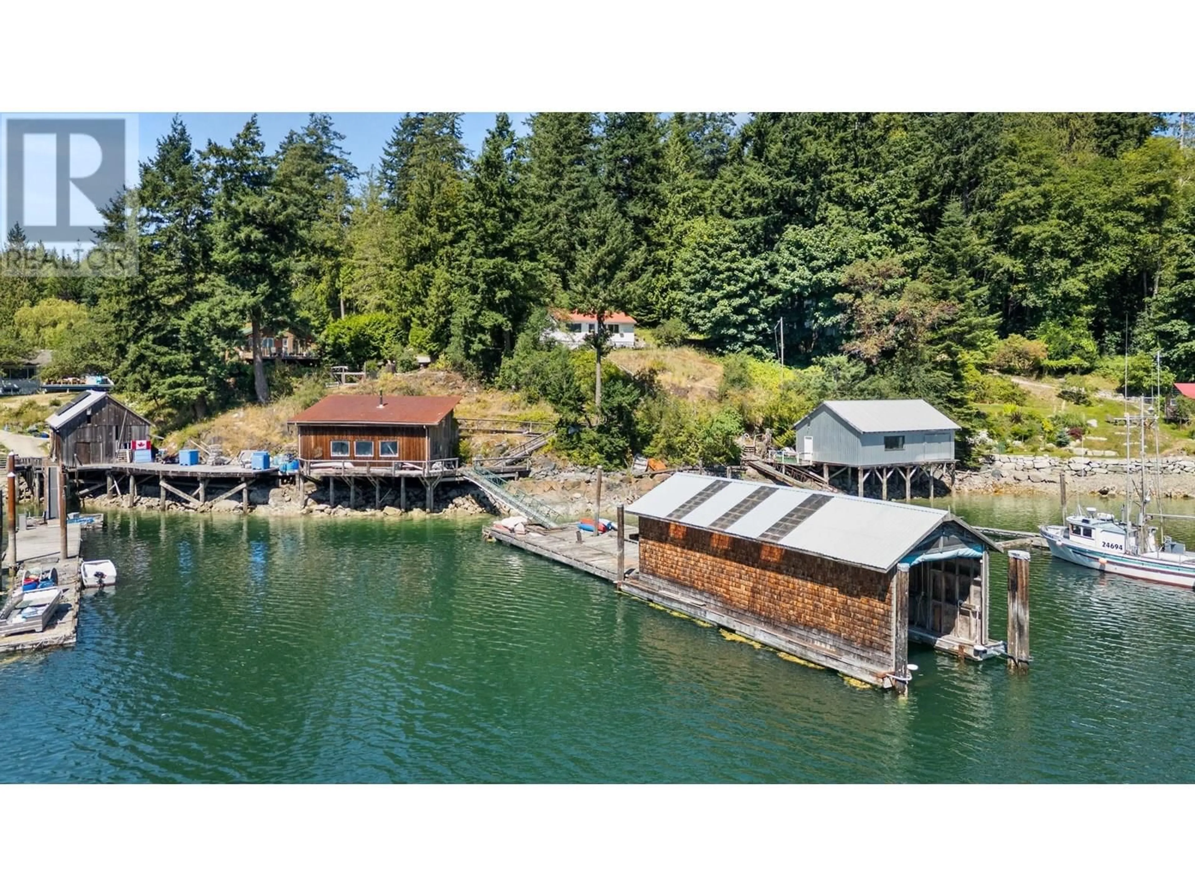 A pic from outside/outdoor area/front of a property/back of a property/a pic from drone, water/lake/river/ocean view for 4371 FRANCIS PENINSULA ROAD, Madeira Park British Columbia V0N2H1
