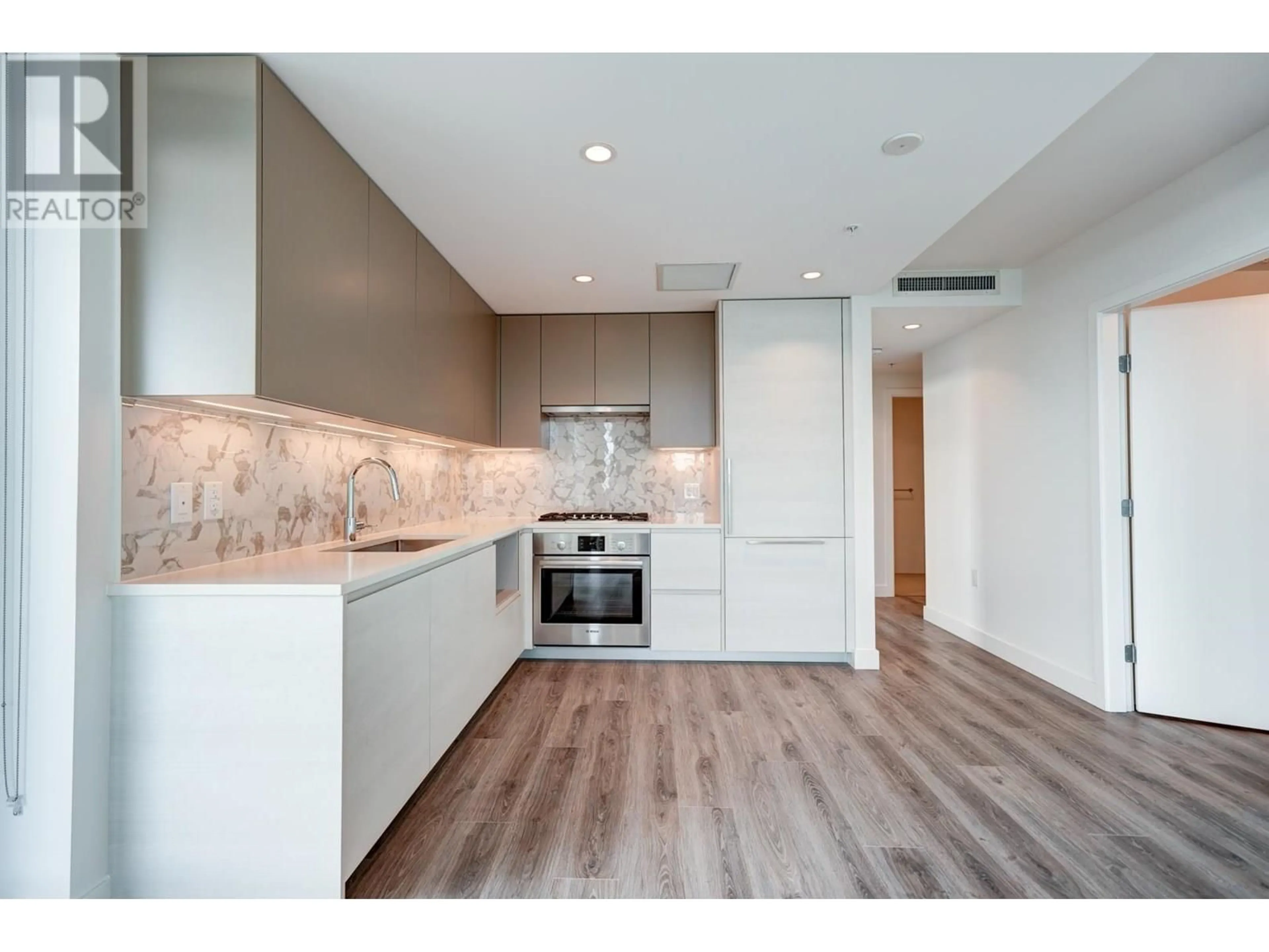 Open concept kitchen, unknown for 1502 - 8188 FRASER STREET, Vancouver British Columbia V5X0J8