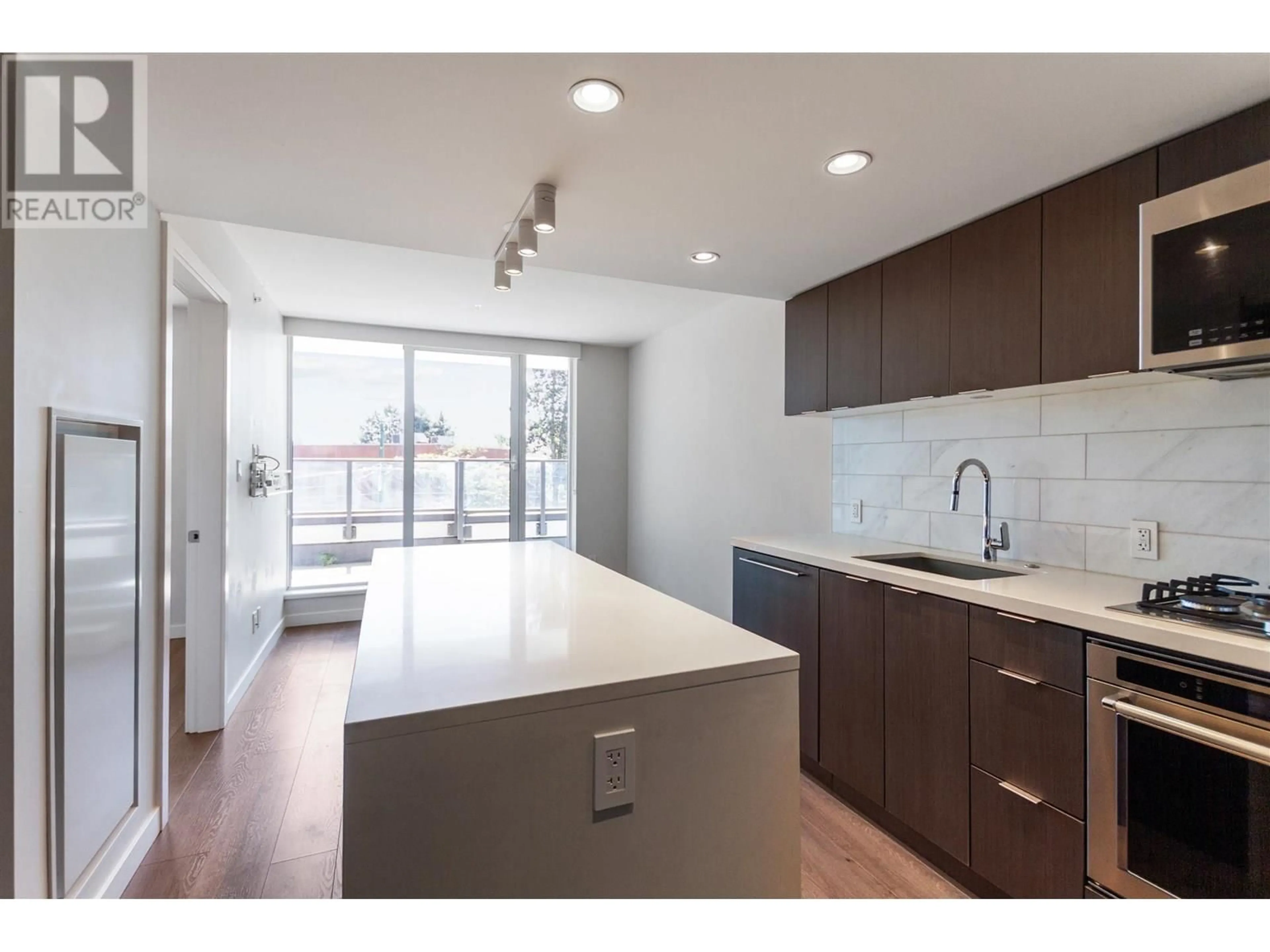 Open concept kitchen, unknown for 208 - 8238 LORD STREET, Vancouver British Columbia V6P0G7