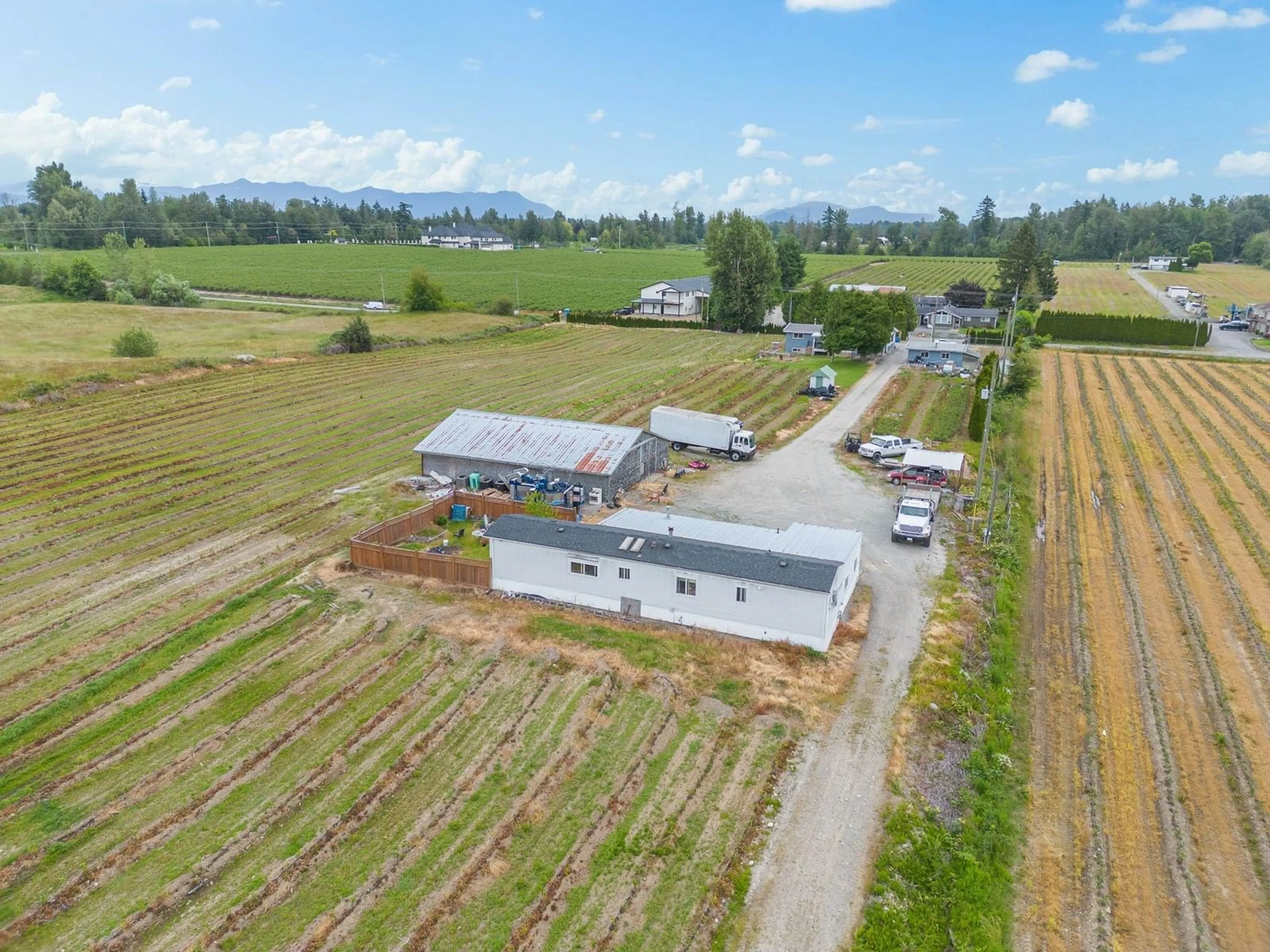 A pic from outside/outdoor area/front of a property/back of a property/a pic from drone, mountain view for 3811 LEFEUVRE, Abbotsford British Columbia V4X1N6