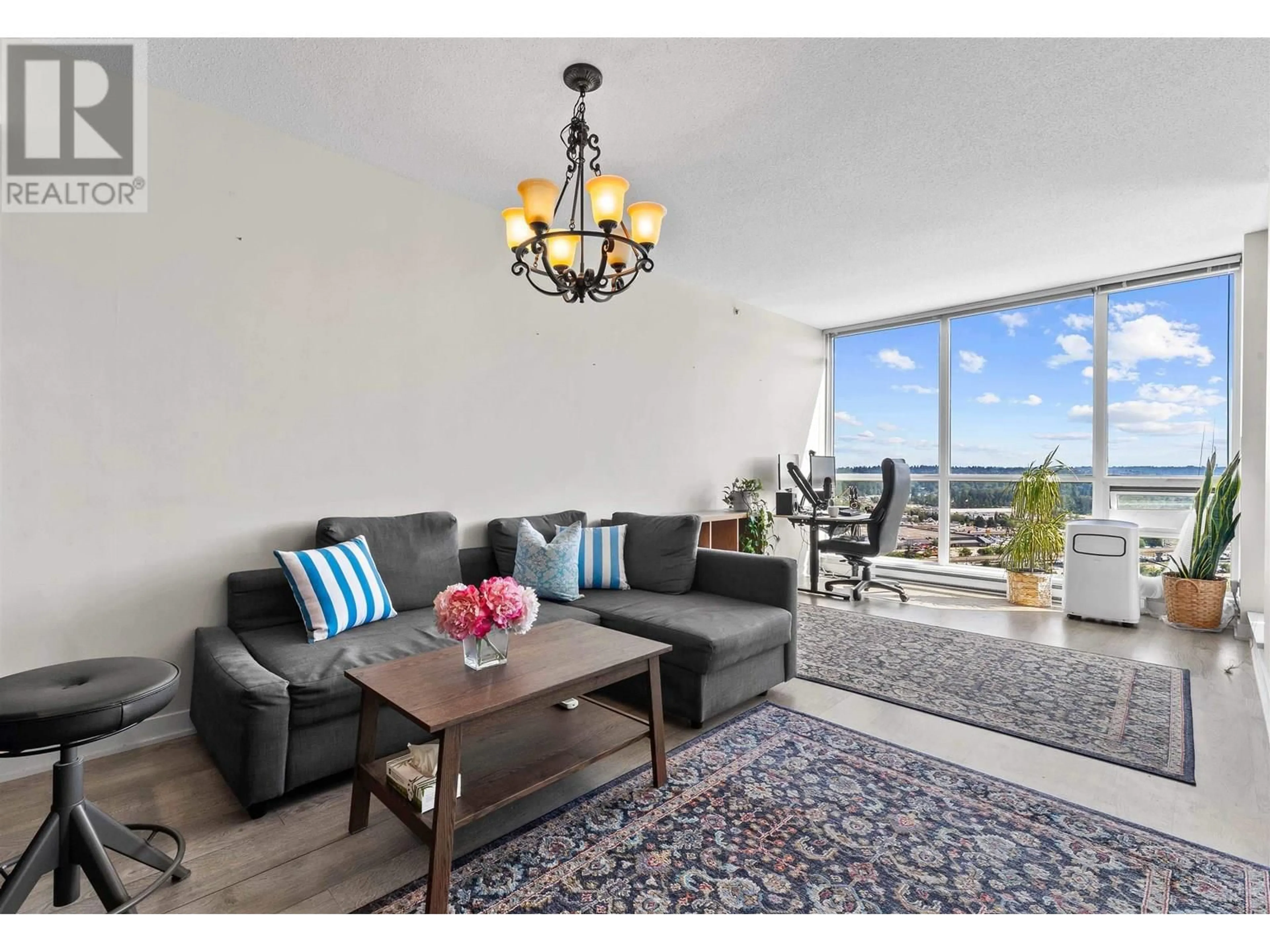 Living room with furniture, wood/laminate floor for 2506 - 2975 ATLANTIC AVENUE, Coquitlam British Columbia V3B0C5