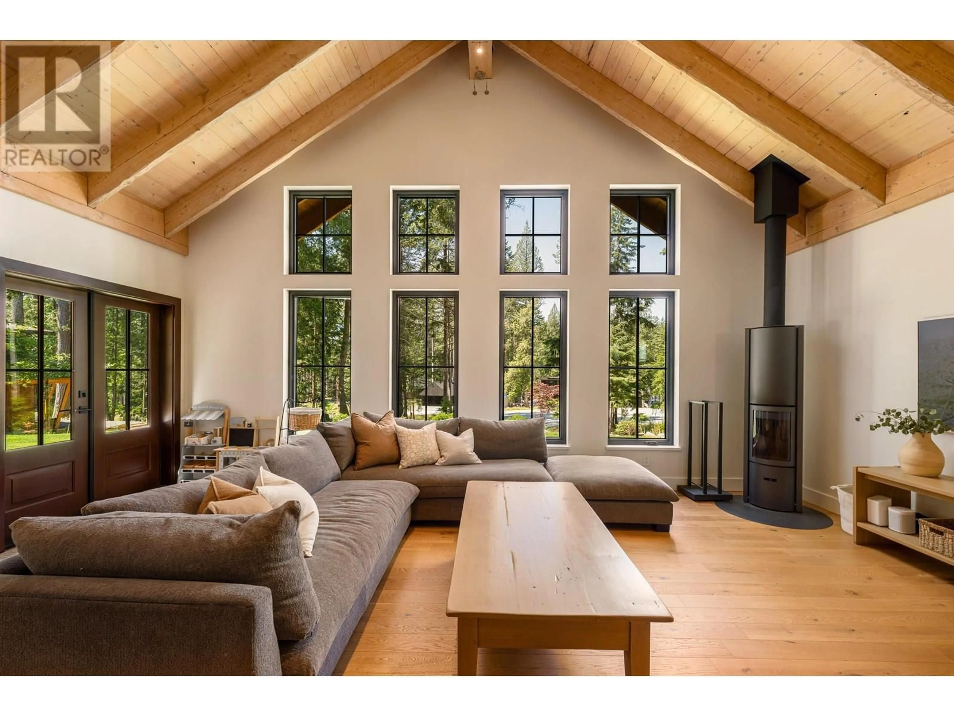 Living room with furniture, wood/laminate floor for 1605 JOAN AUDREY LANE, Bowen Island British Columbia V0N1G2