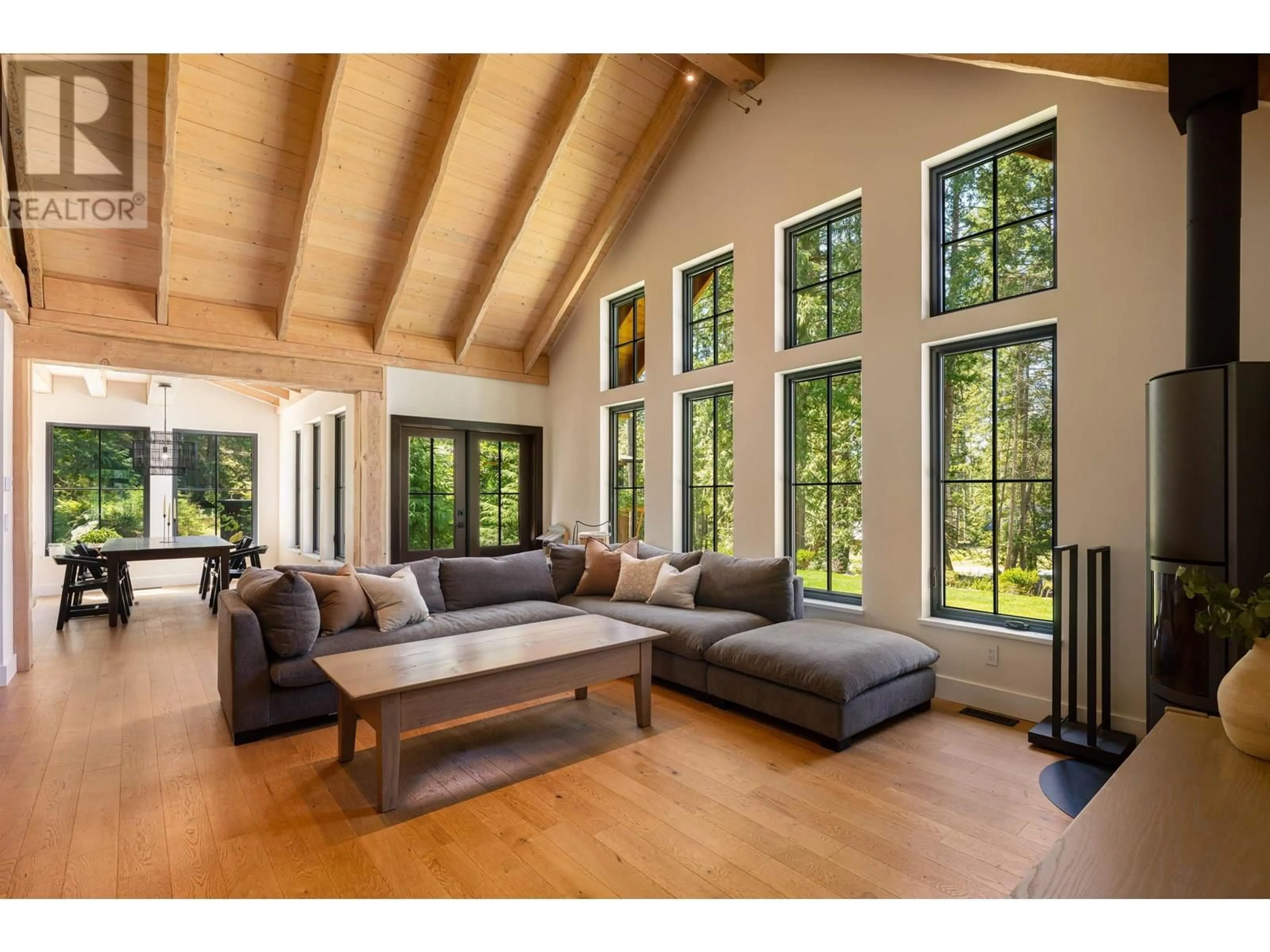 Living room with furniture, wood/laminate floor for 1605 JOAN AUDREY LANE, Bowen Island British Columbia V0N1G2