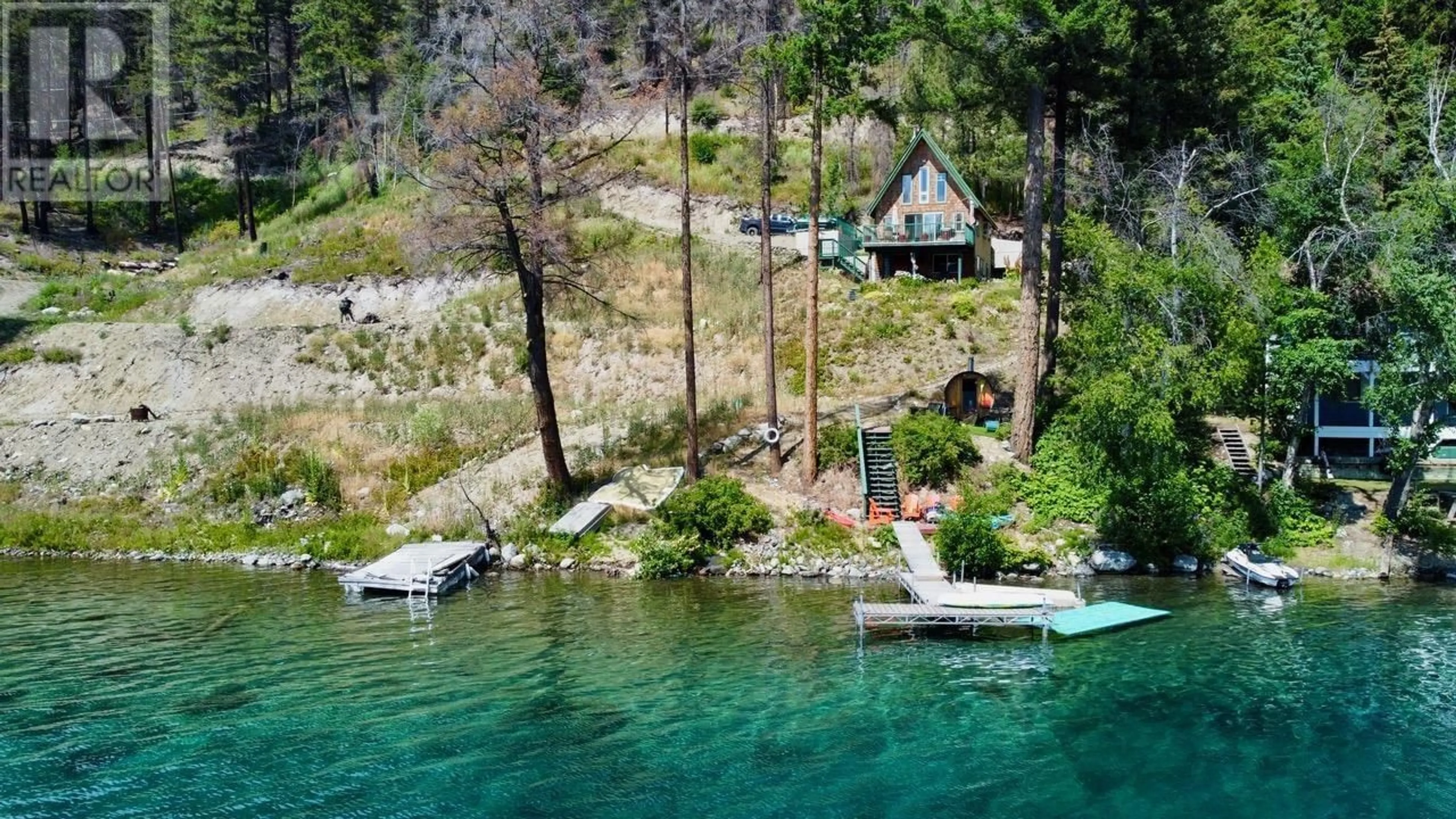 A pic from outside/outdoor area/front of a property/back of a property/a pic from drone, water/lake/river/ocean view for 9348 GUN LAKE ROAD, Pemberton British Columbia V0K1P0