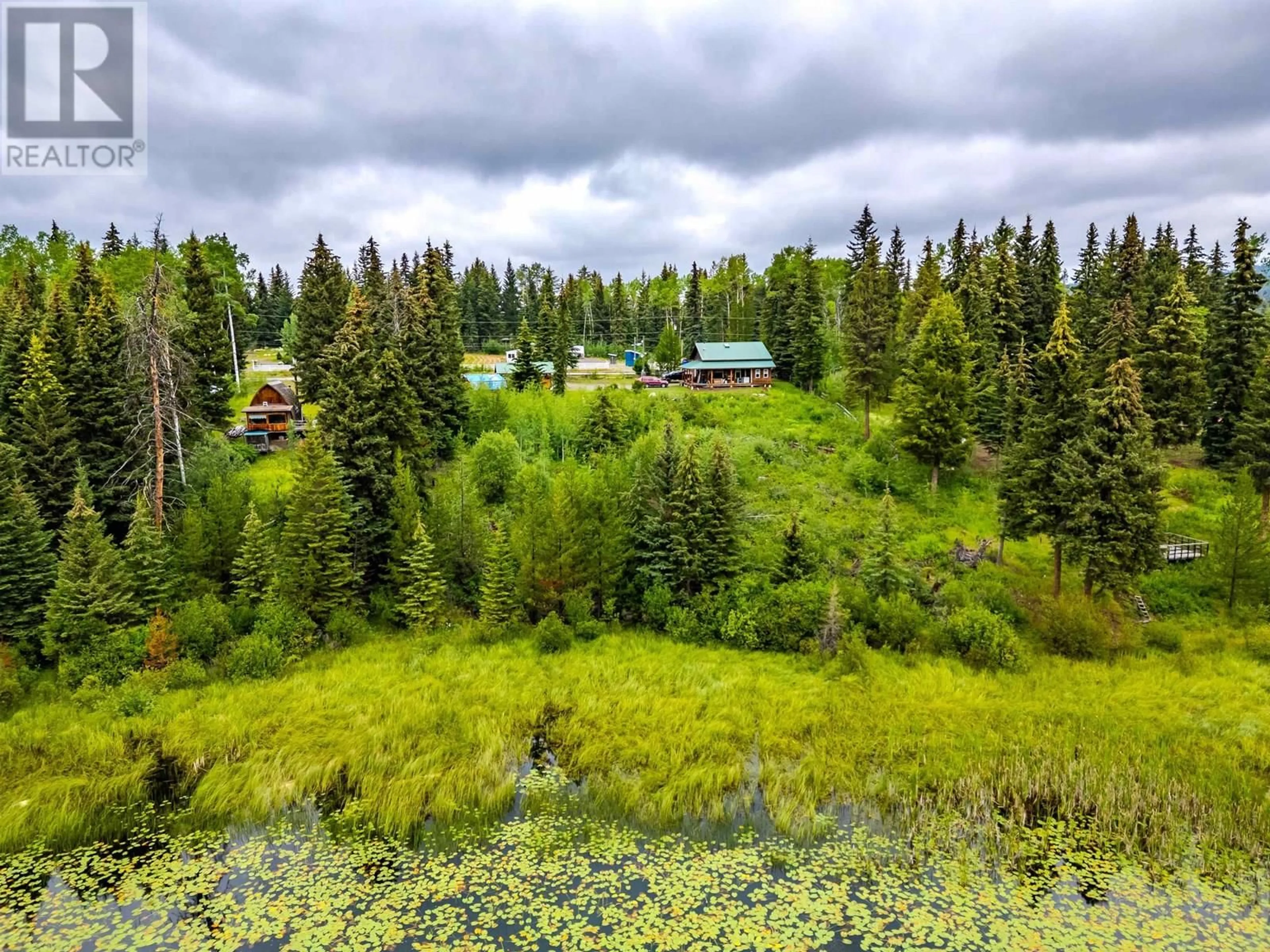 A pic from outside/outdoor area/front of a property/back of a property/a pic from drone, forest/trees view for 7478 BURGESS ROAD, Deka Lake / Sulphurous / Hathaway Lakes British Columbia V0K1X3