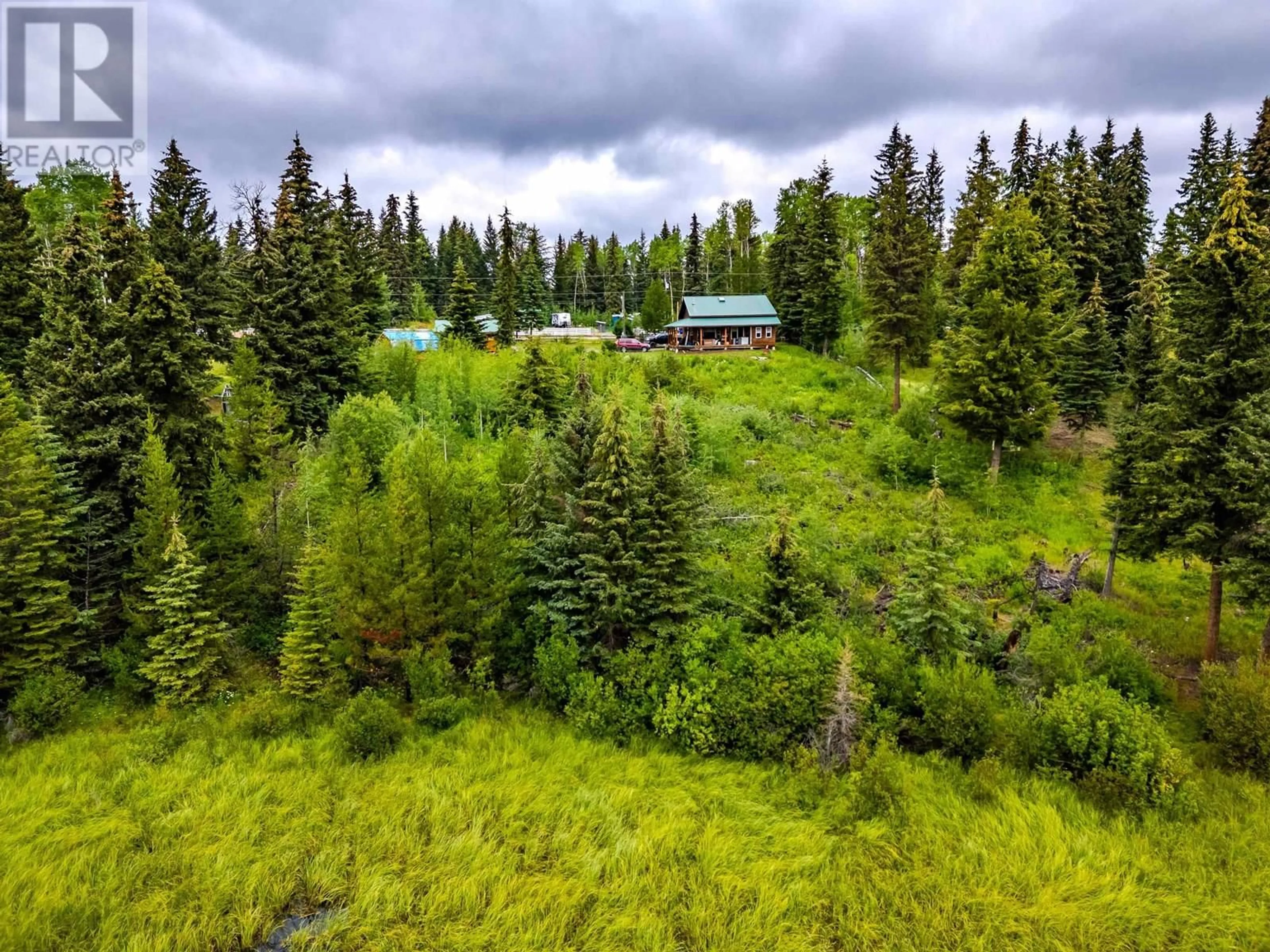 A pic from outside/outdoor area/front of a property/back of a property/a pic from drone, forest/trees view for 7478 BURGESS ROAD, Deka Lake / Sulphurous / Hathaway Lakes British Columbia V0K1X3