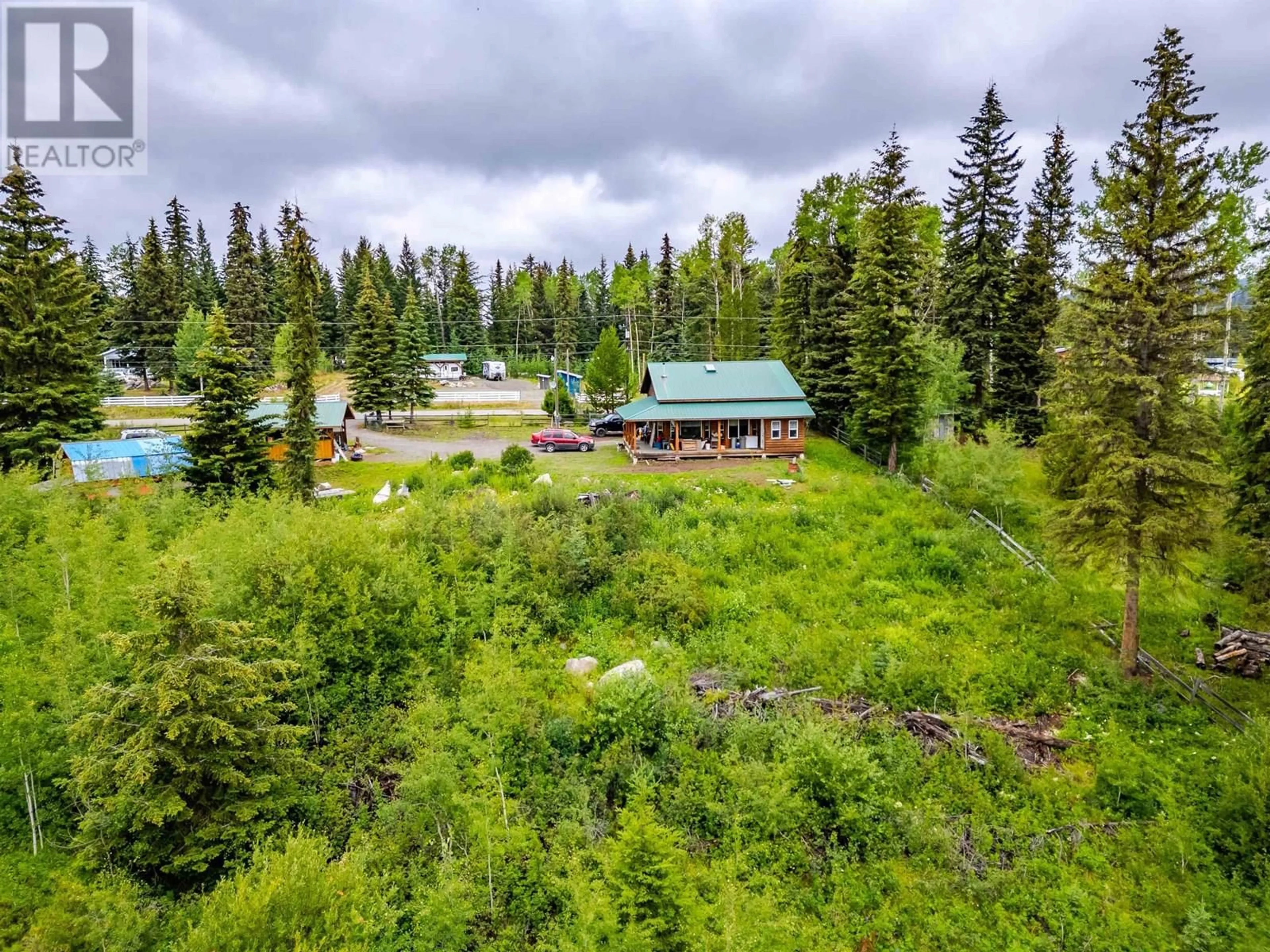 A pic from outside/outdoor area/front of a property/back of a property/a pic from drone, forest/trees view for 7478 BURGESS ROAD, Deka Lake / Sulphurous / Hathaway Lakes British Columbia V0K1X3