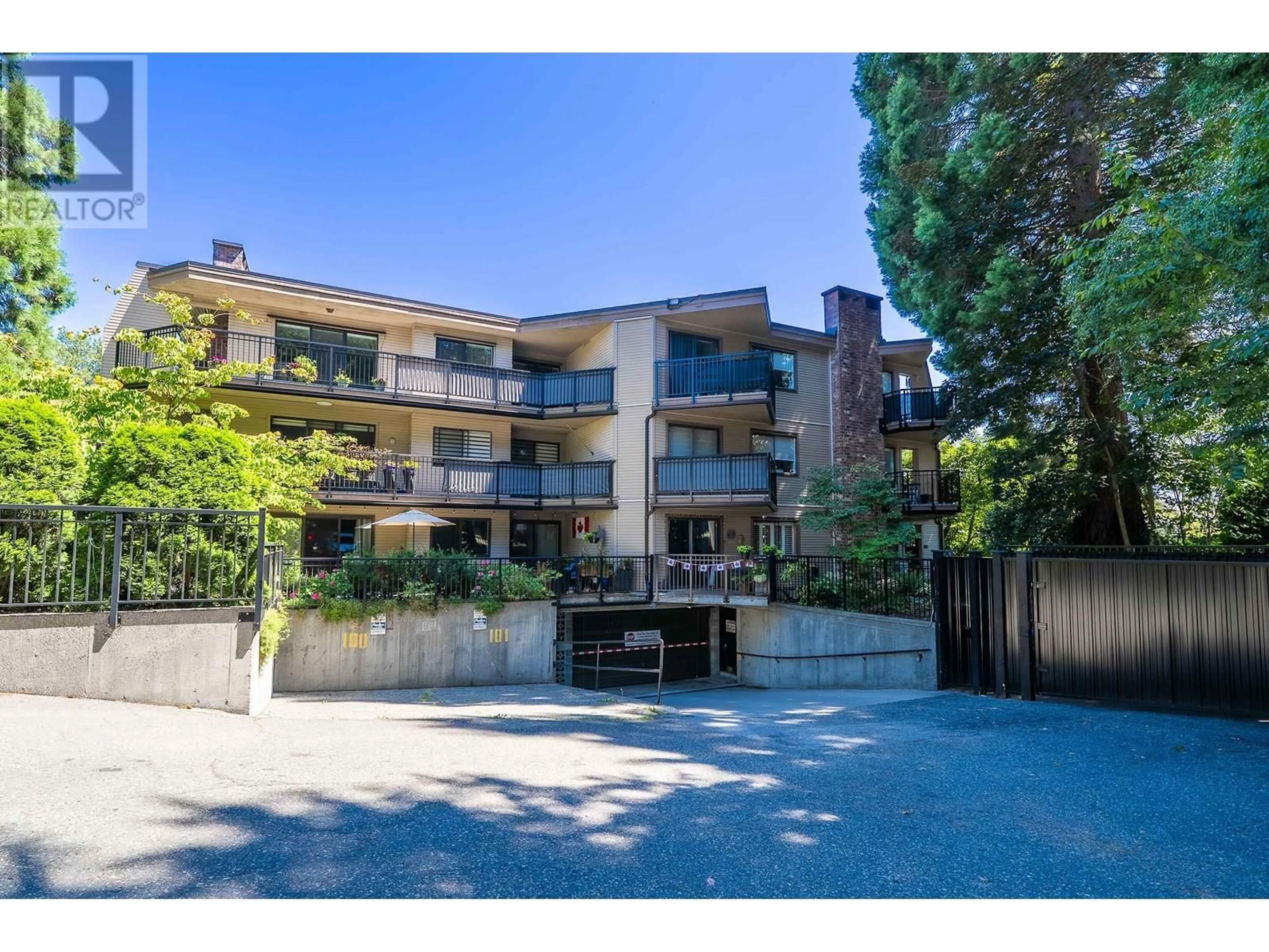A pic from outside/outdoor area/front of a property/back of a property/a pic from drone, street for 214 - 1385 DRAYCOTT ROAD, North Vancouver British Columbia V7J3K9