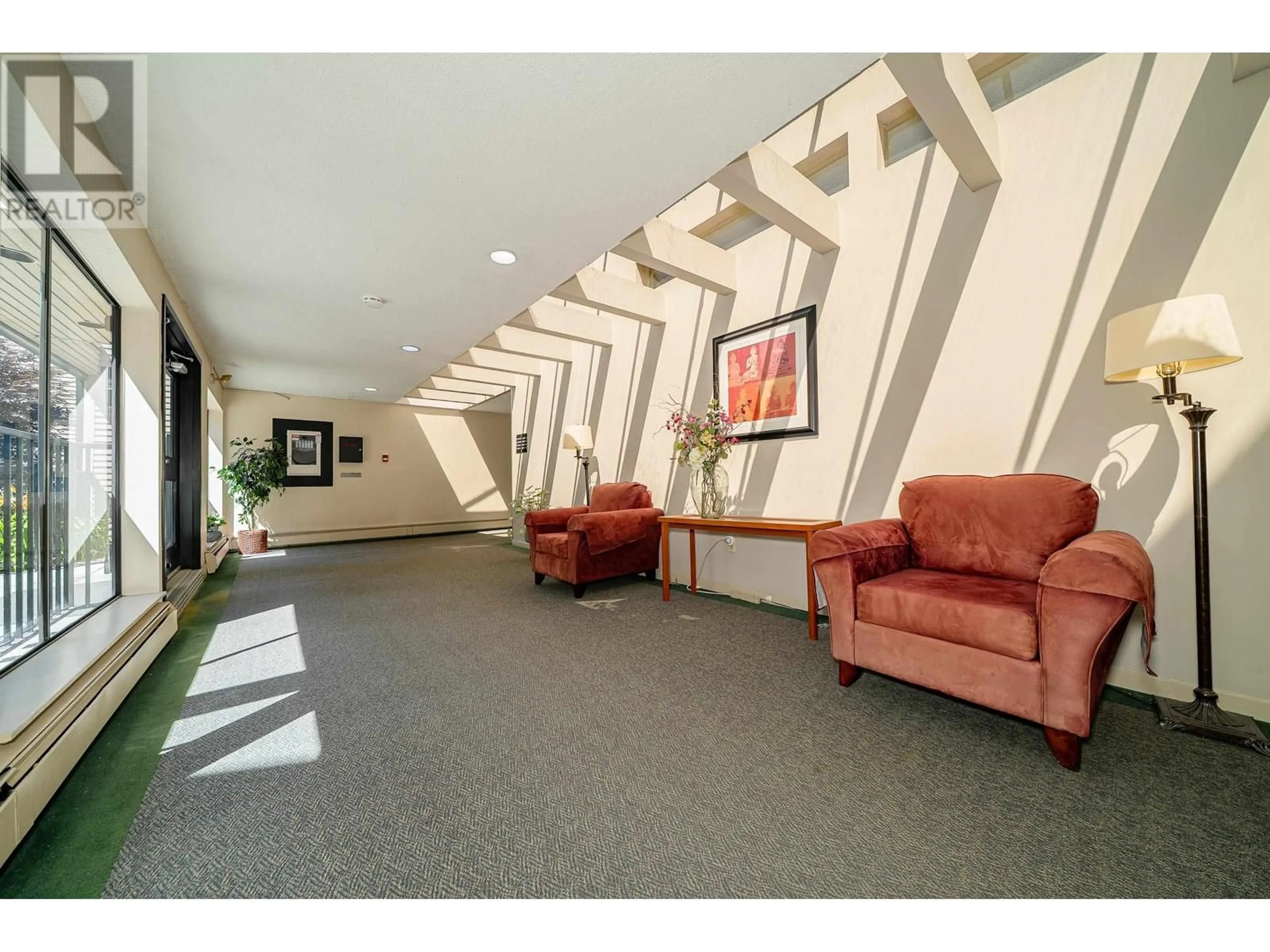 Indoor foyer for 214 - 1385 DRAYCOTT ROAD, North Vancouver British Columbia V7J3K9