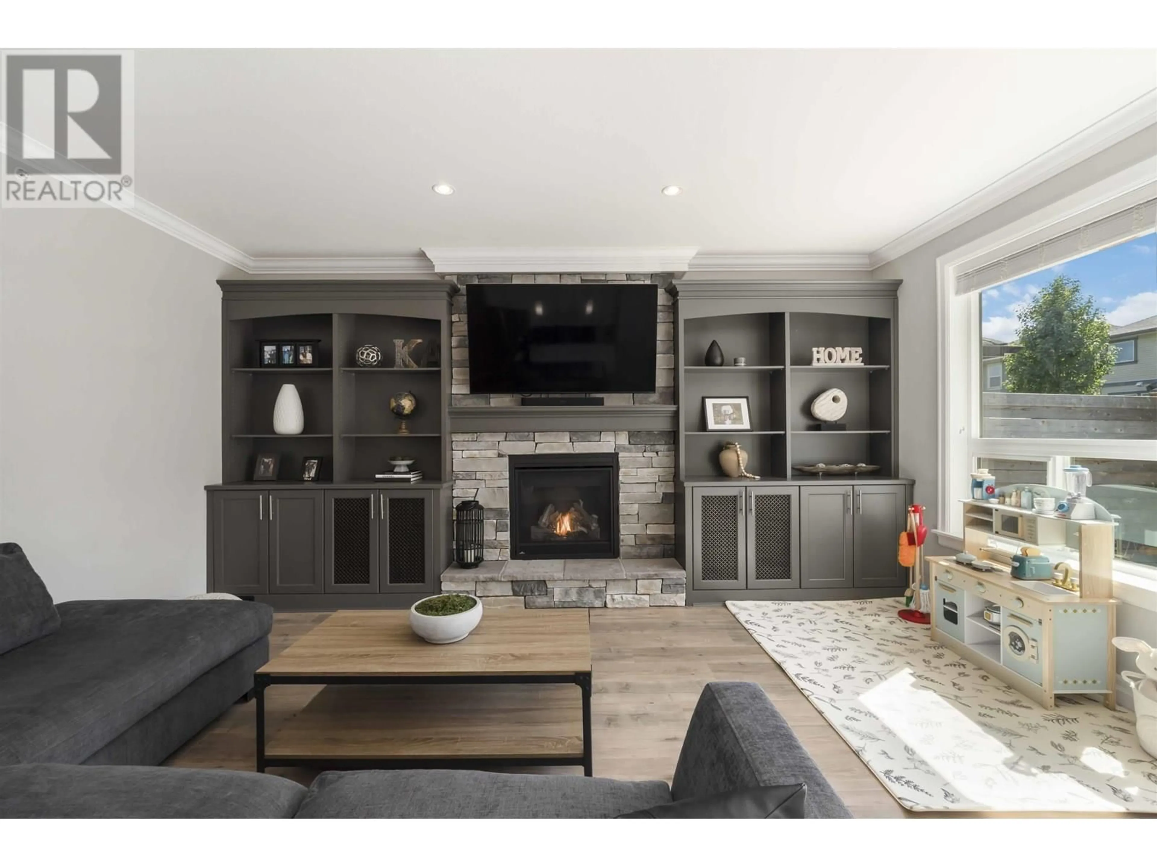 Living room with furniture, wood/laminate floor for 13673 230A STREET, Maple Ridge British Columbia V4R0G4