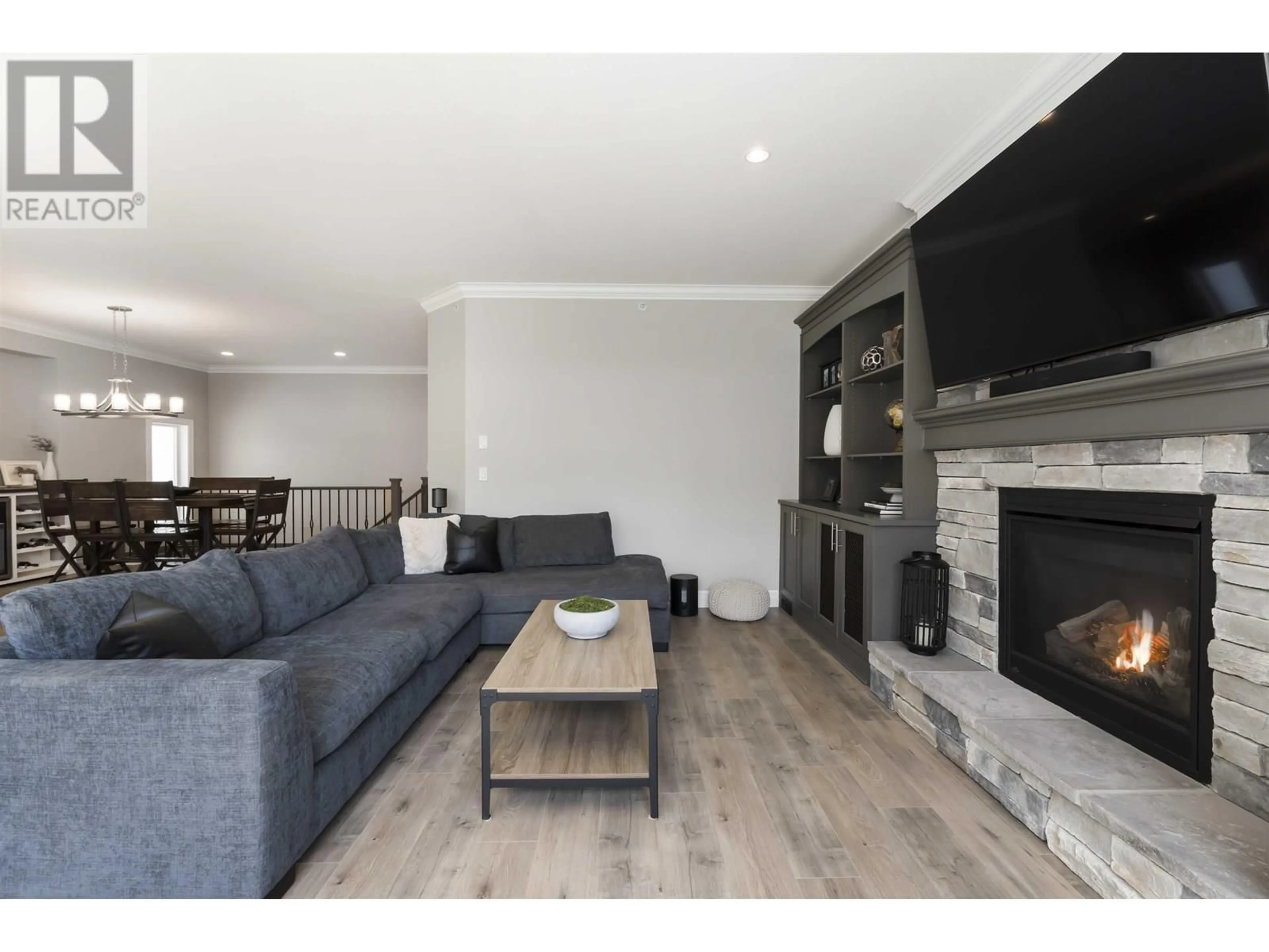 Living room with furniture, wood/laminate floor for 13673 230A STREET, Maple Ridge British Columbia V4R0G4