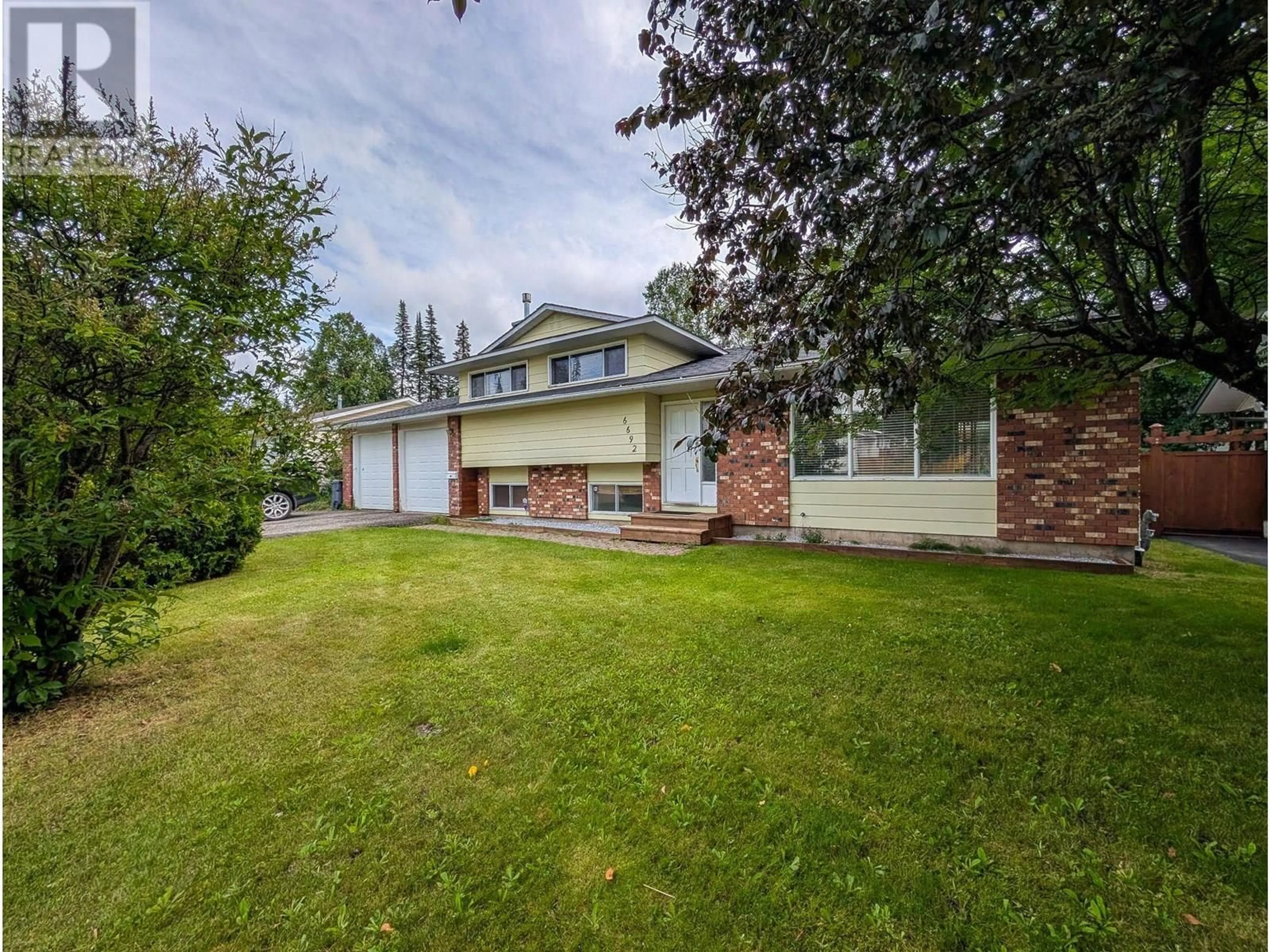 A pic from outside/outdoor area/front of a property/back of a property/a pic from drone, street for 6692 LILAC CRESCENT, Prince George British Columbia V2K3G9