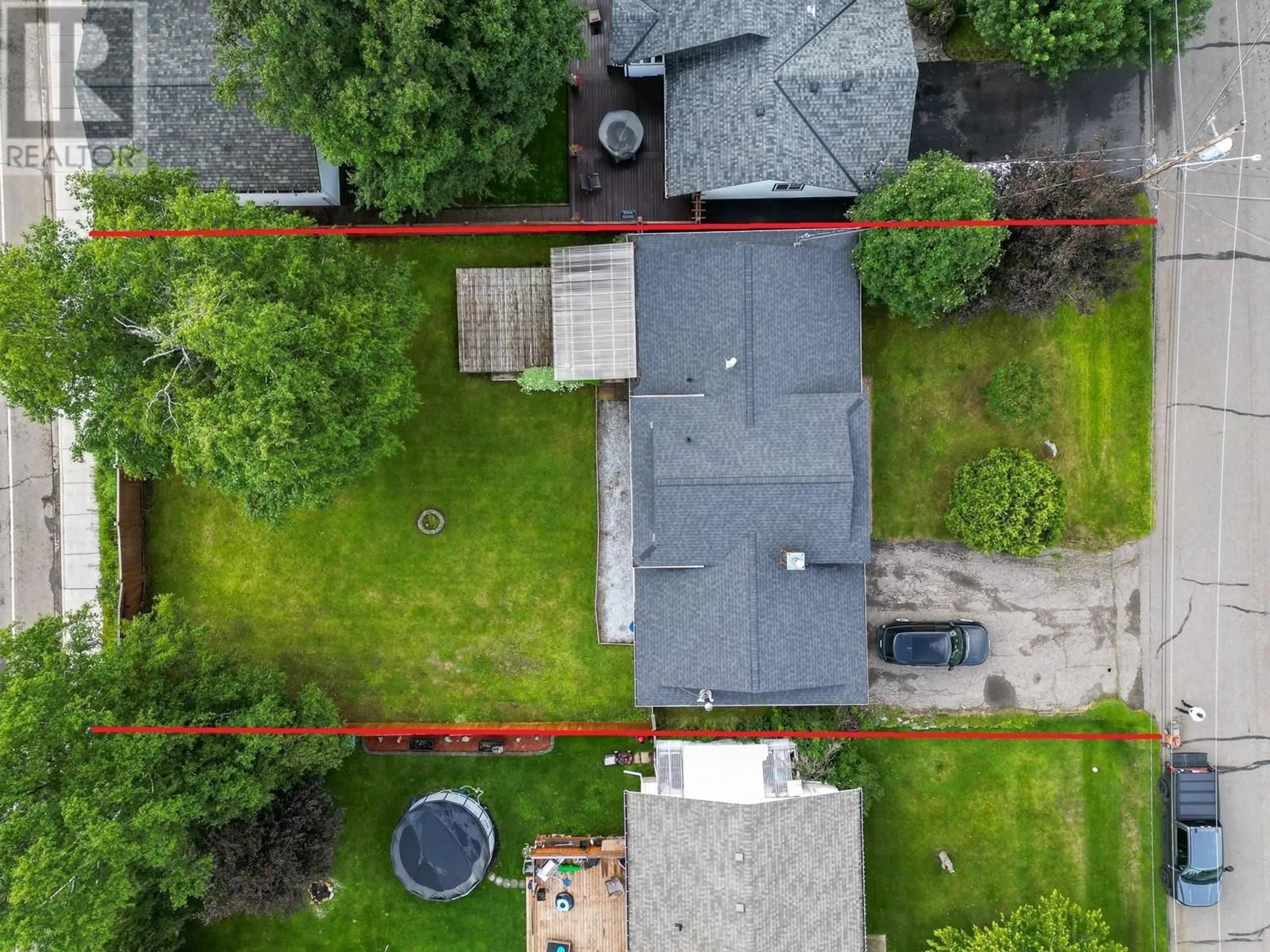 A pic from outside/outdoor area/front of a property/back of a property/a pic from drone, street for 6692 LILAC CRESCENT, Prince George British Columbia V2K3G9