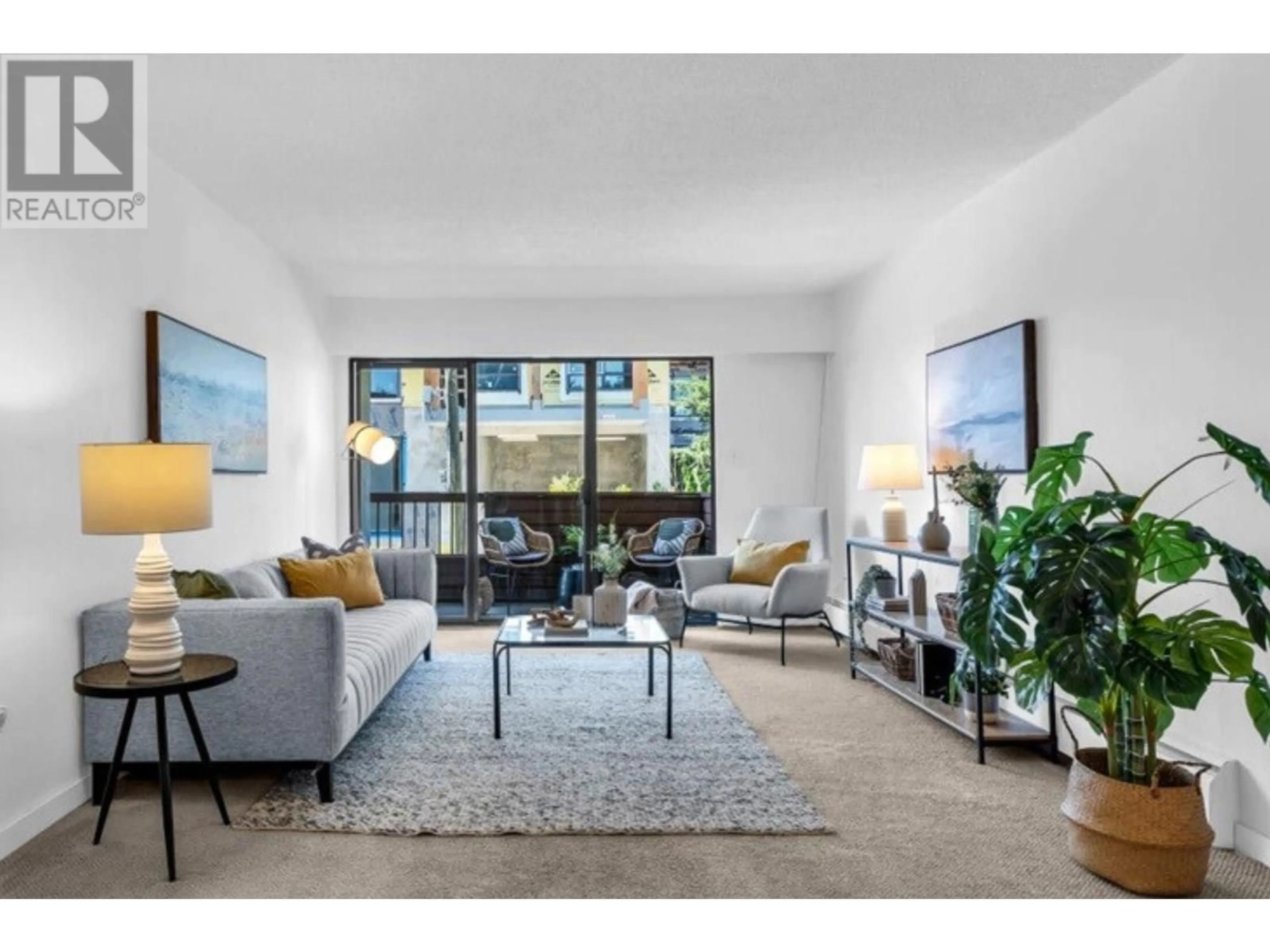 Living room with furniture, unknown for 204 - 122 17TH STREET, North Vancouver British Columbia V7L2V5