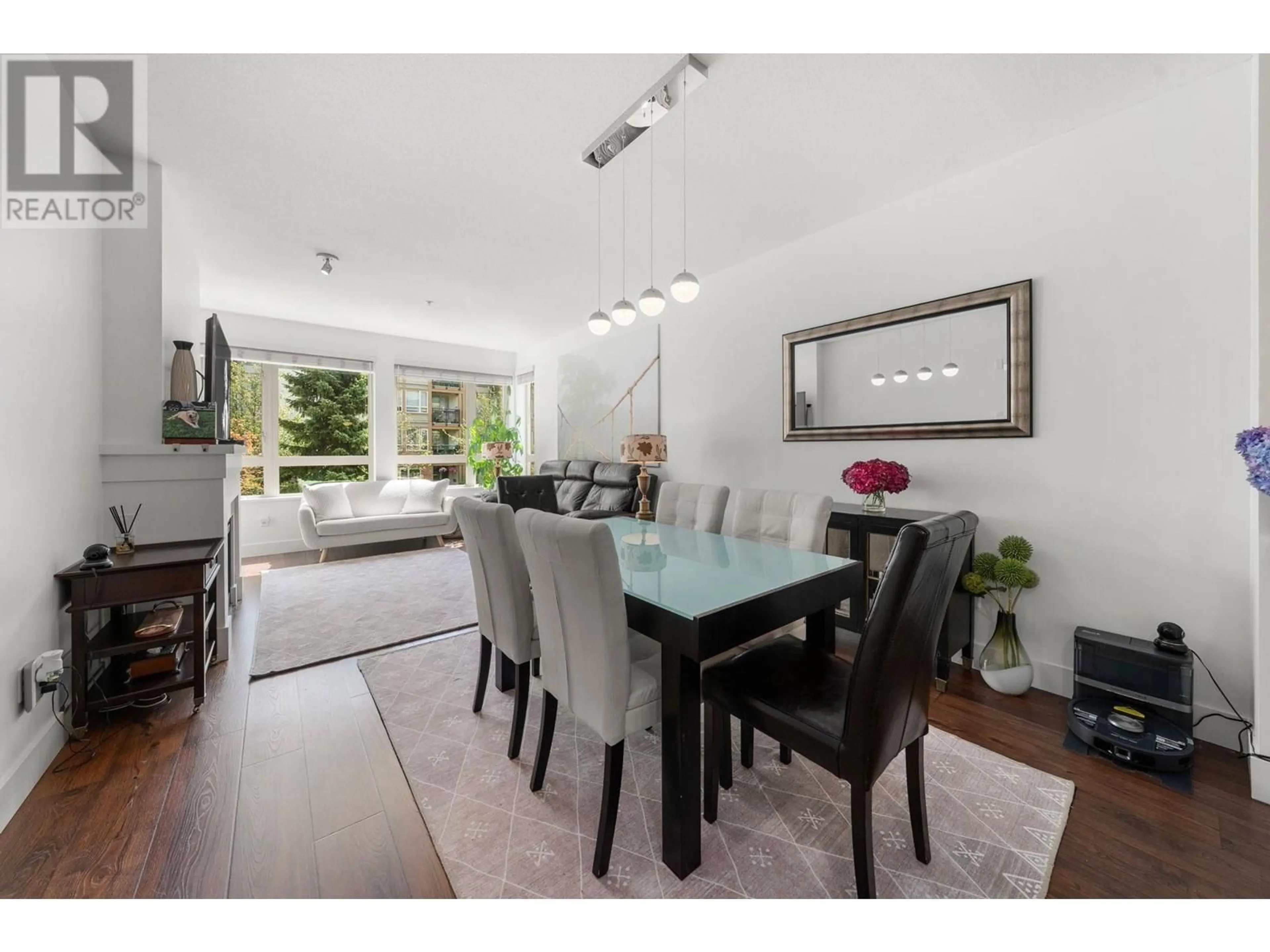 Dining room, wood/laminate floor for 204 - 1111 27TH STREET, North Vancouver British Columbia V7J1S3