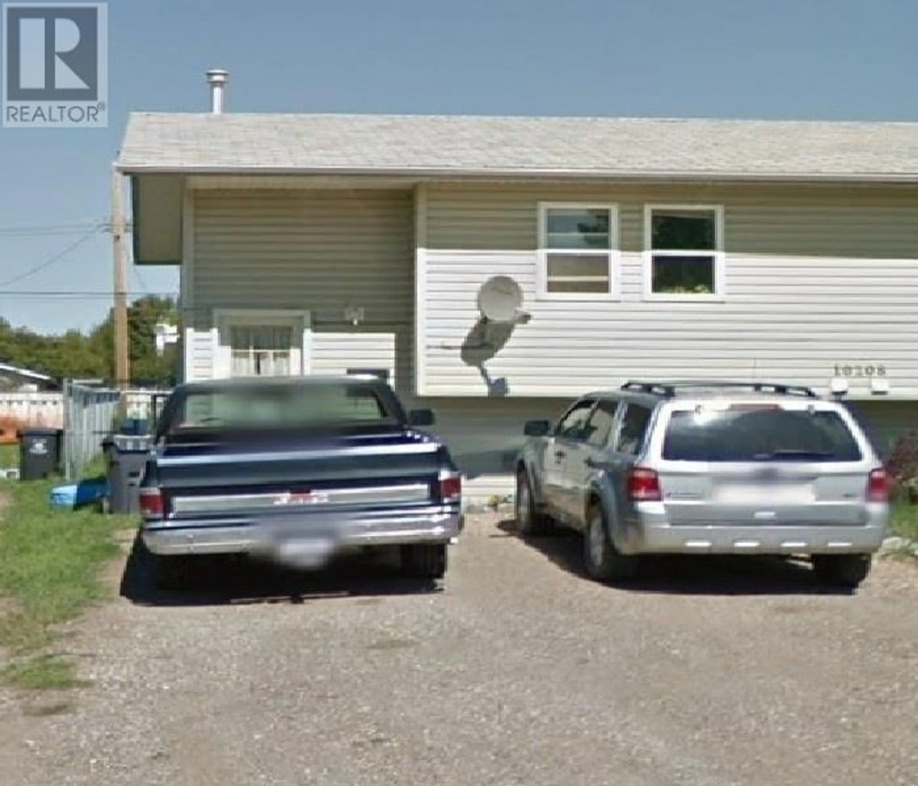A pic from outside/outdoor area/front of a property/back of a property/a pic from drone, street for 10208 103 AVENUE, Fort St. John British Columbia V1J2H8