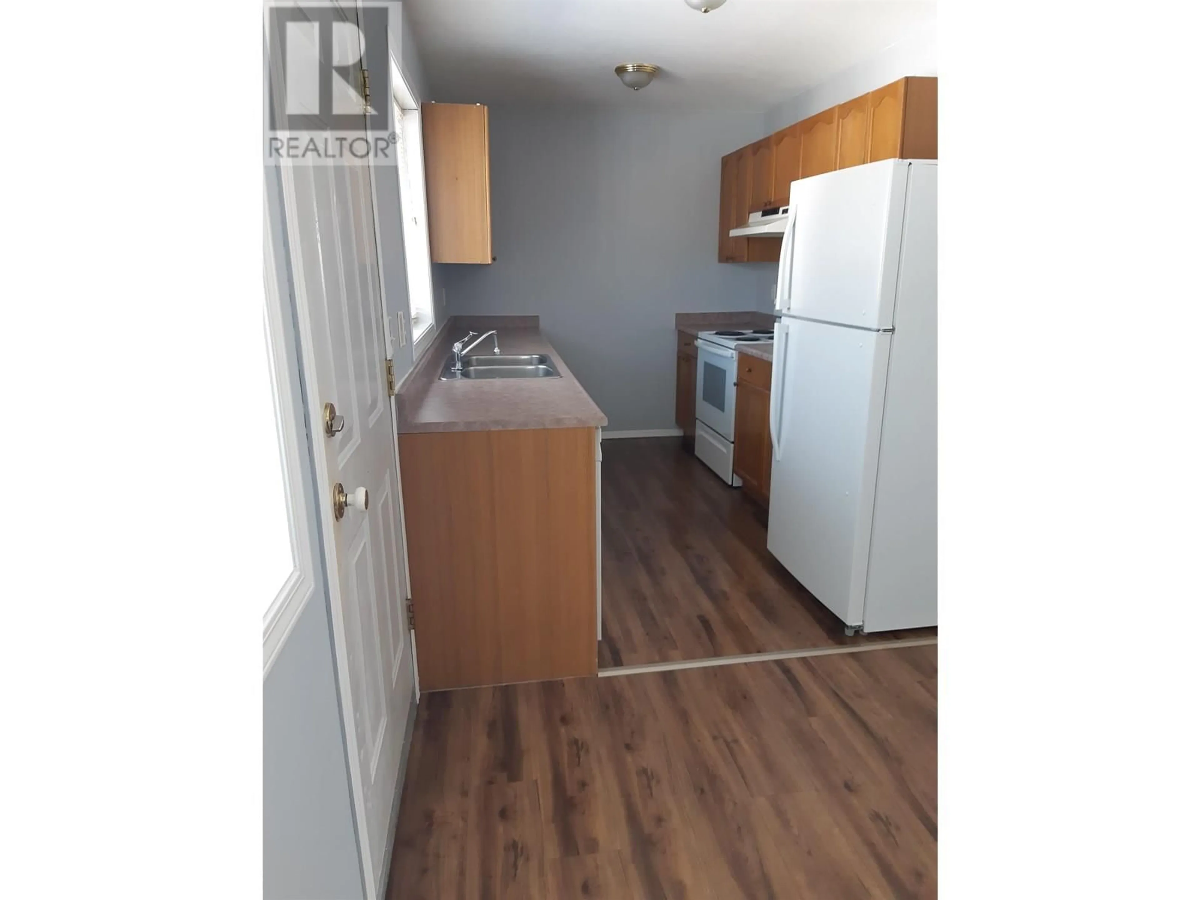 Standard kitchen, wood/laminate floor for 10208 103 AVENUE, Fort St. John British Columbia V1J2H8