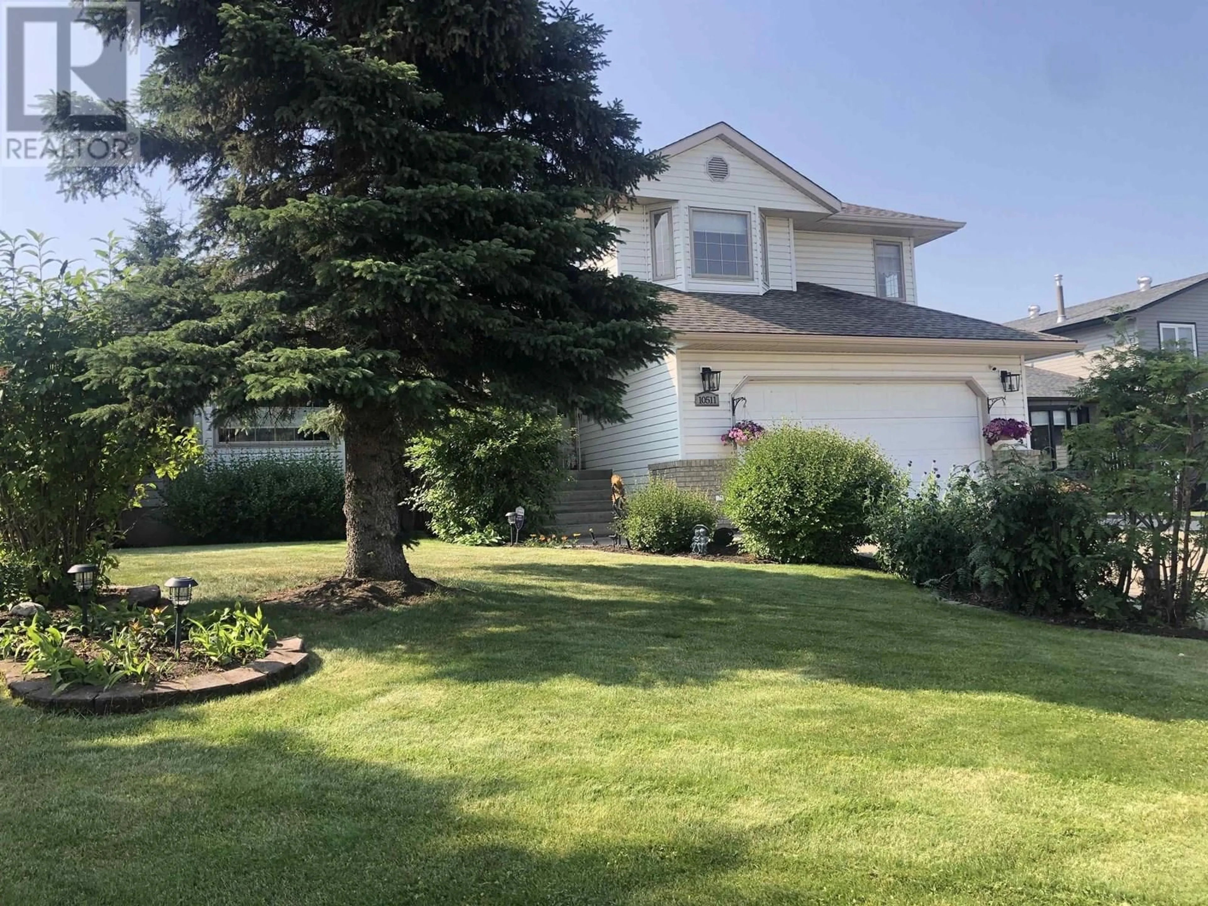 A pic from outside/outdoor area/front of a property/back of a property/a pic from drone, unknown for 10511 114 AVENUE, Fort St. John British Columbia V1J6H7