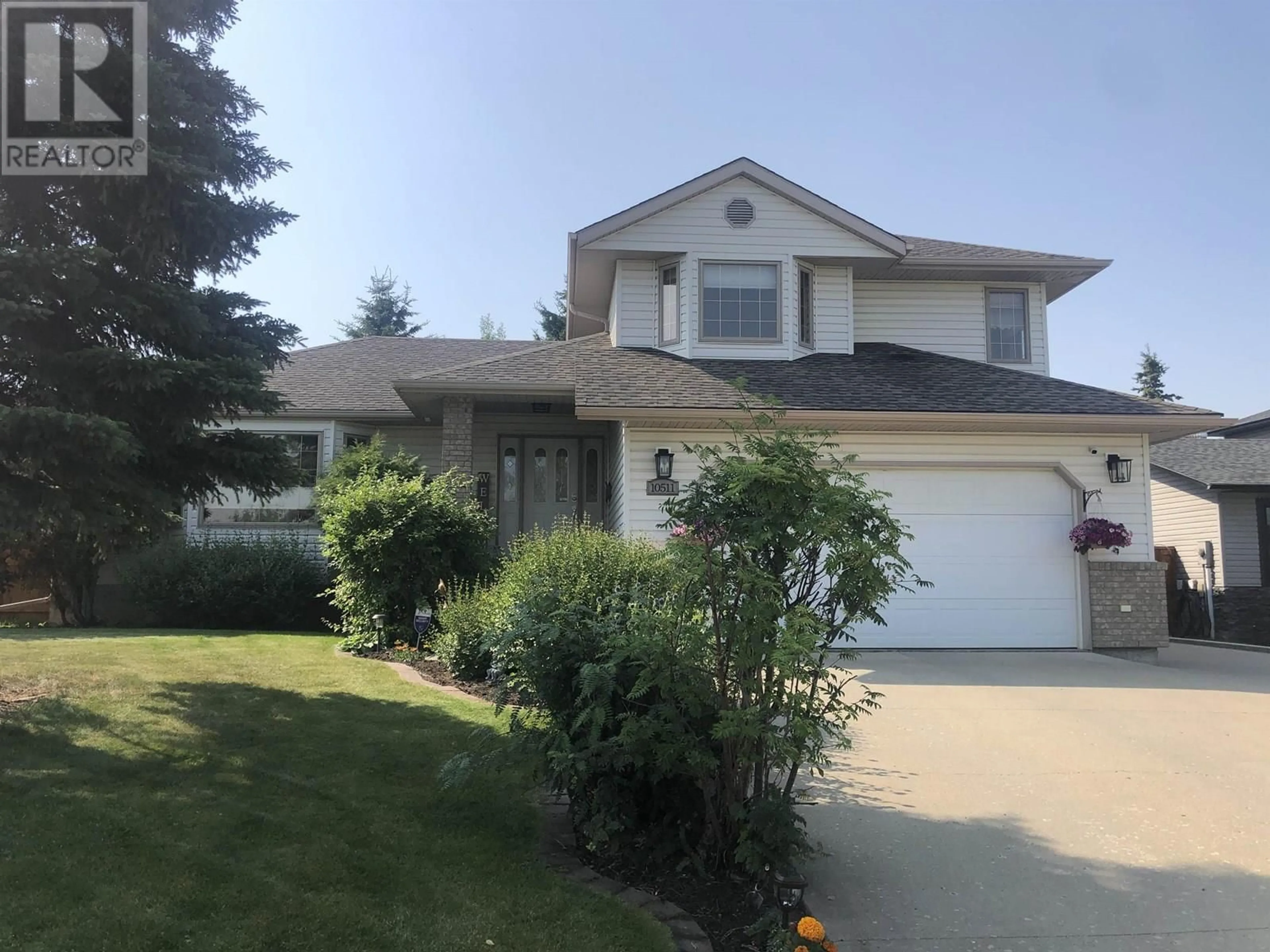 Home with vinyl exterior material, street for 10511 114 AVENUE, Fort St. John British Columbia V1J6H7