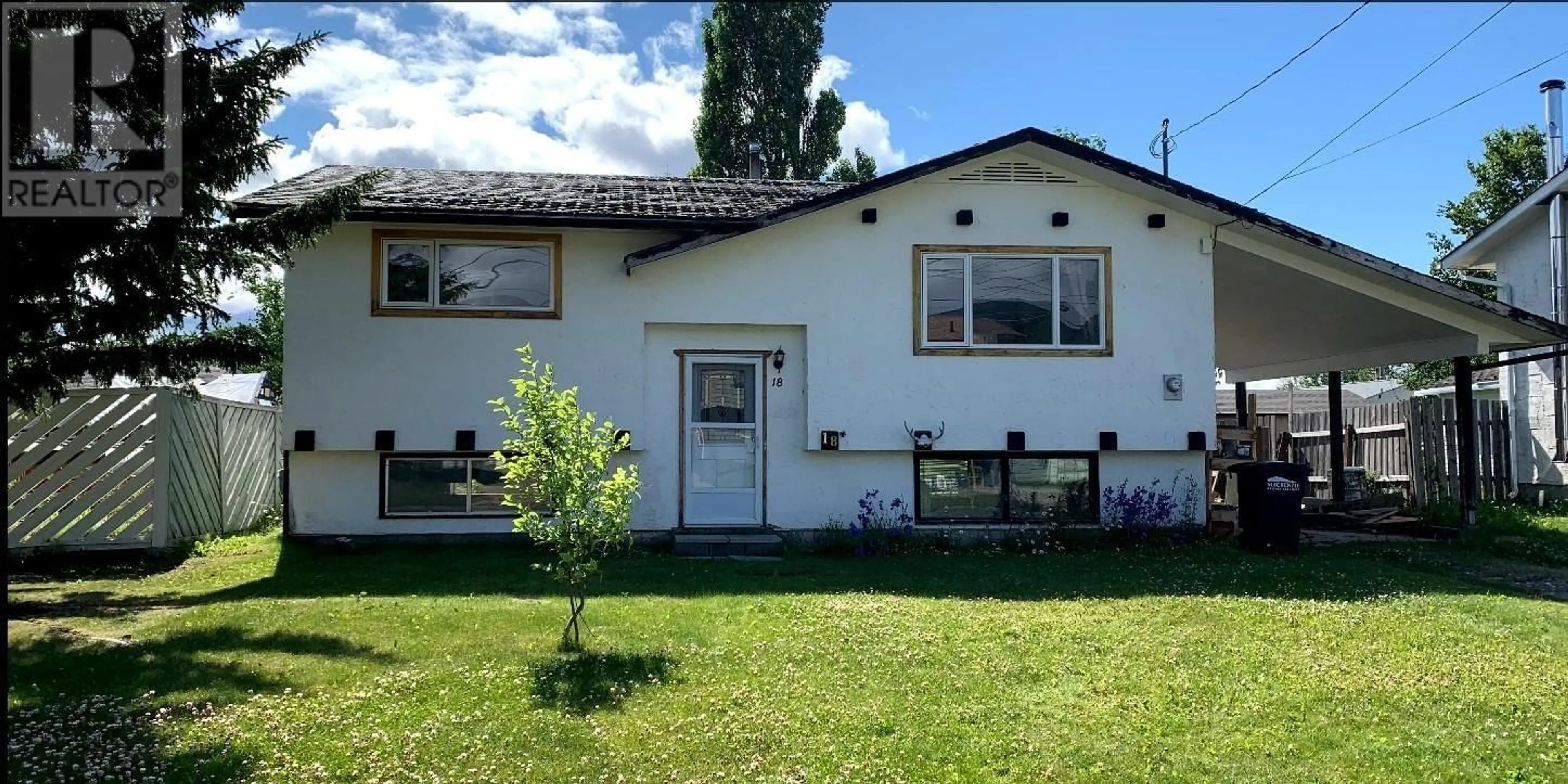 Home with vinyl exterior material, street for 18 MUNRO CRESCENT, Mackenzie British Columbia V0J2C0