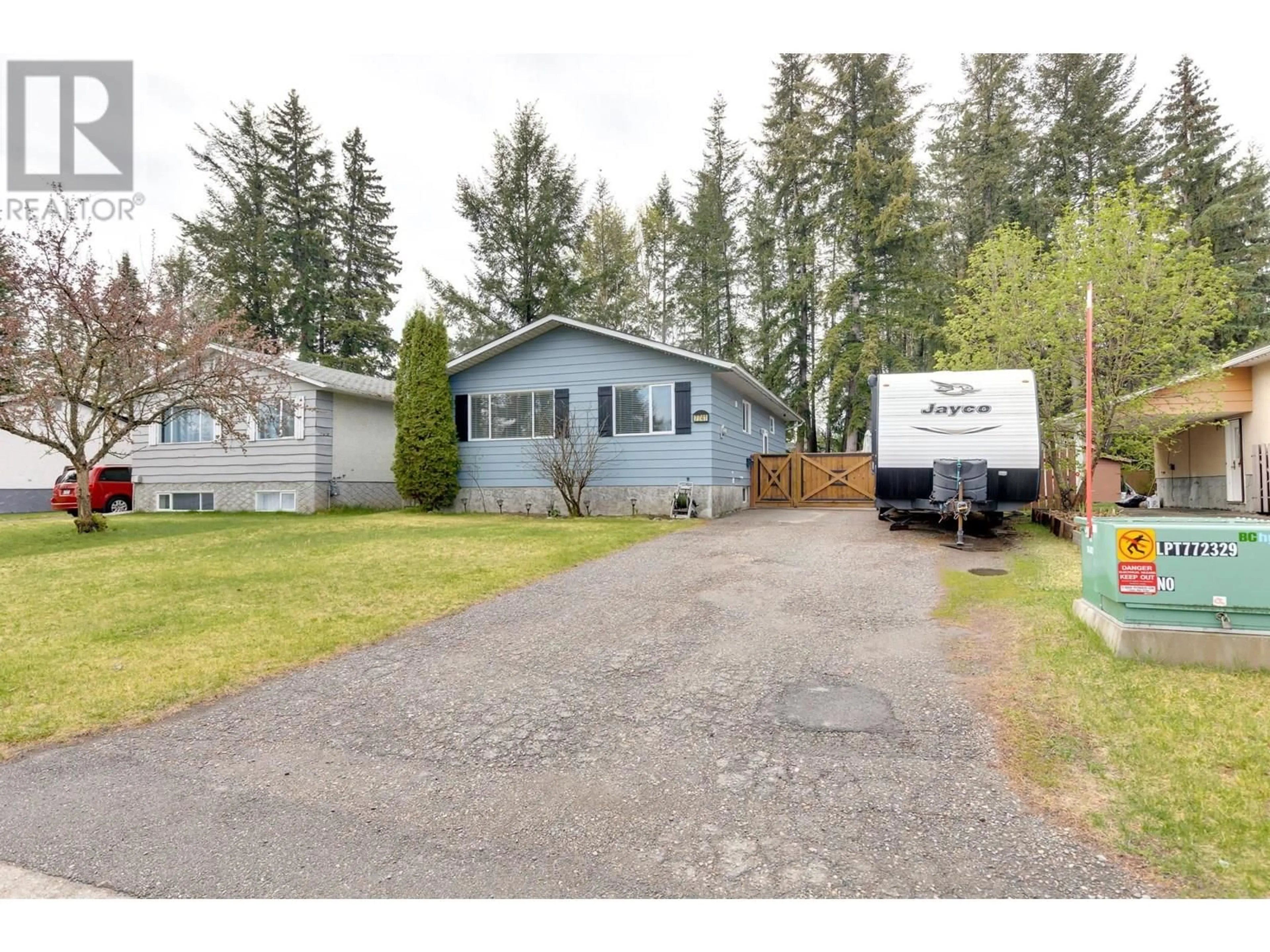 Home with vinyl exterior material, street for 7741 LANCASTER CRESCENT, Prince George British Columbia V2N3R2