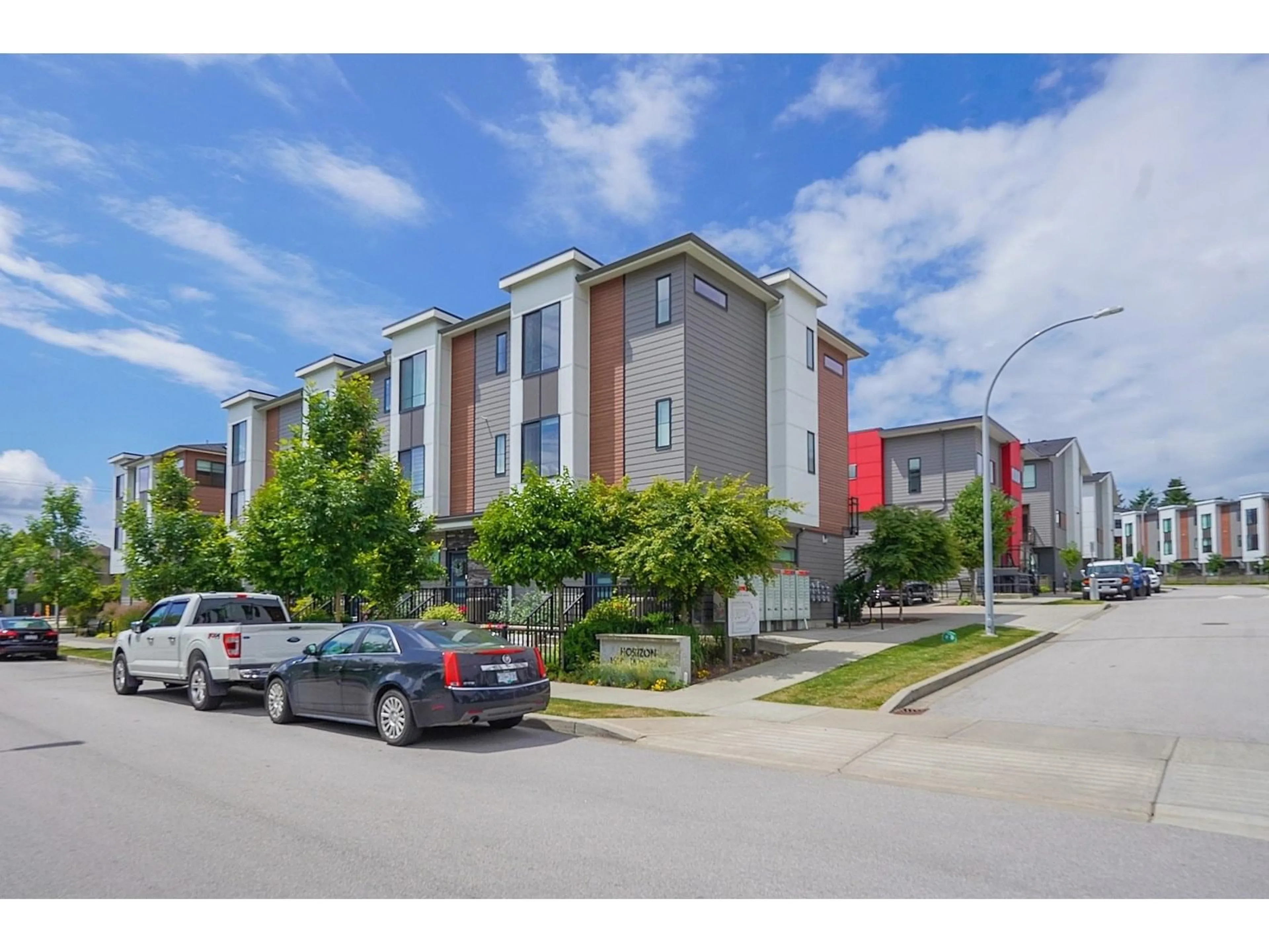 A pic from outside/outdoor area/front of a property/back of a property/a pic from drone, street for 10 - 1639 162, Surrey British Columbia V4A4Y1