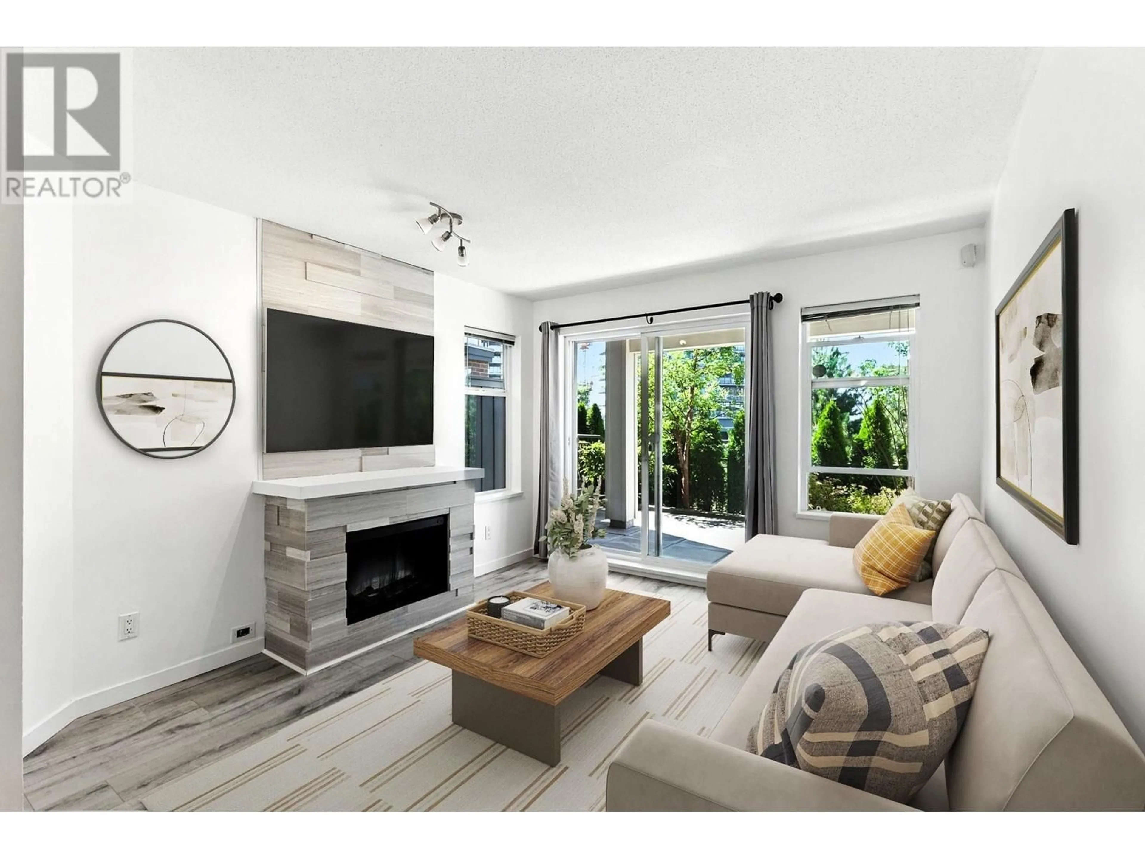 Living room with furniture, unknown for 102 - 4788 BRENTWOOD DRIVE, Burnaby British Columbia V5C0C5