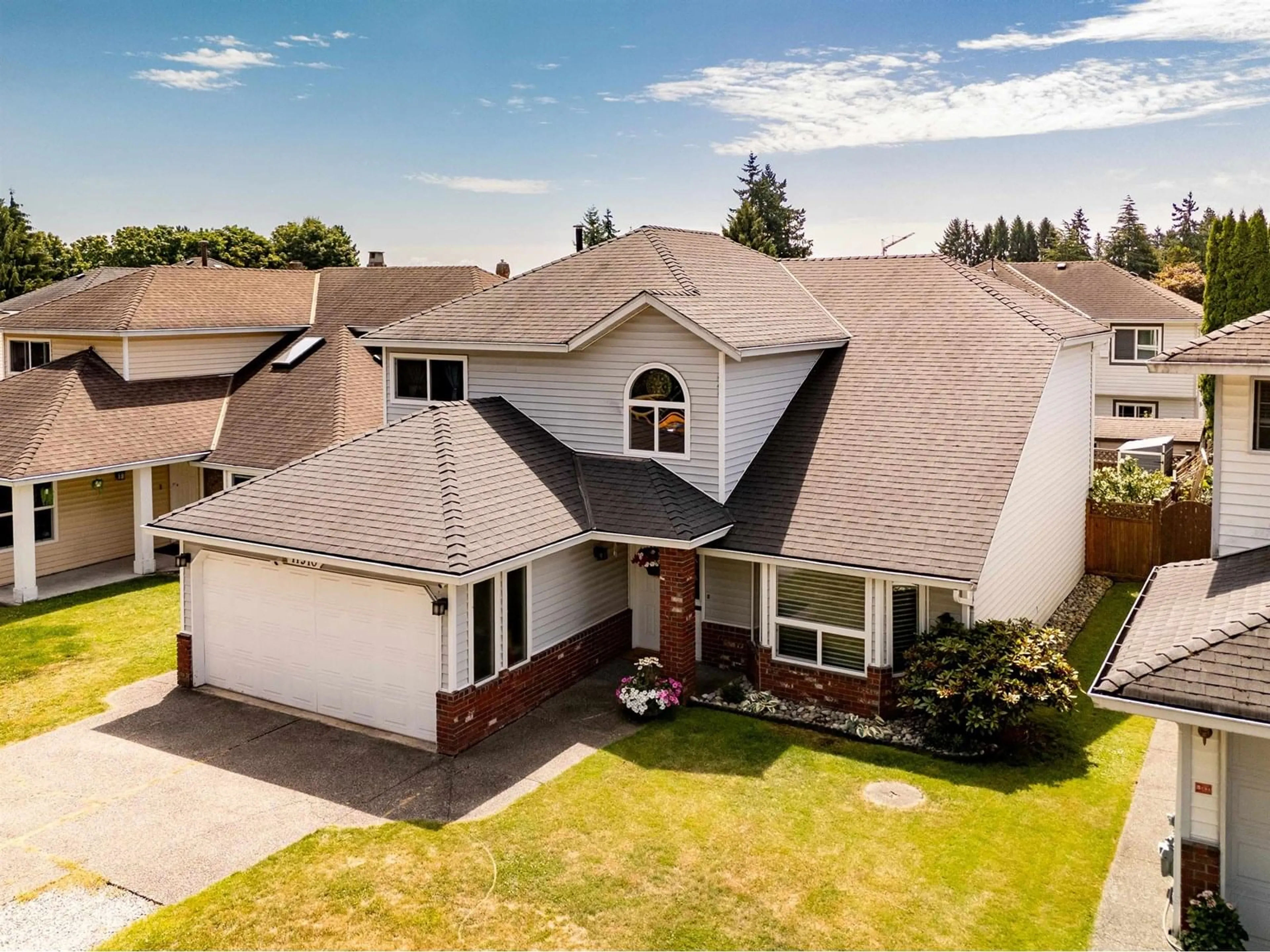 A pic from outside/outdoor area/front of a property/back of a property/a pic from drone, street for 11910 79A, Delta British Columbia V4C8B8