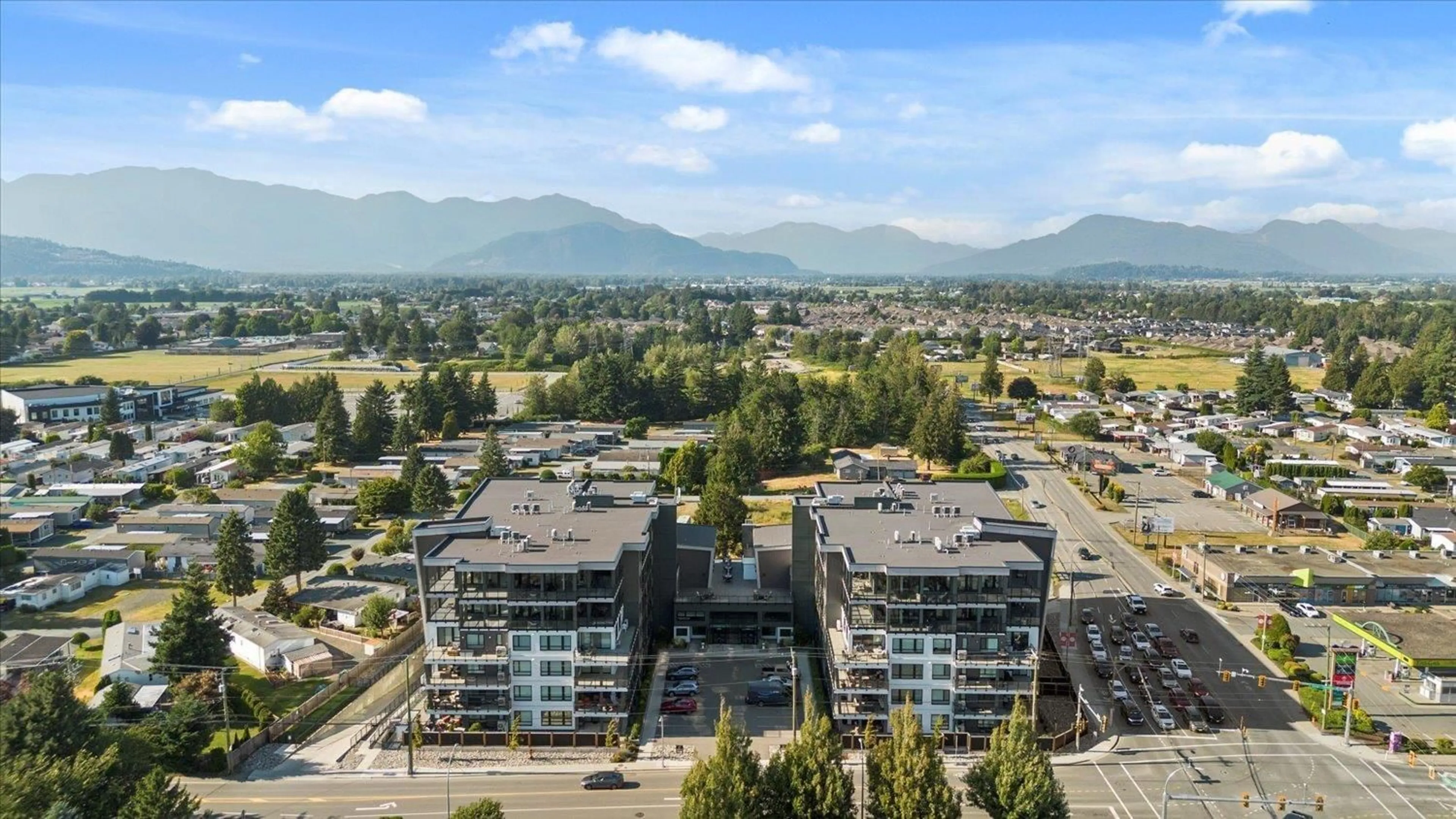 A pic from outside/outdoor area/front of a property/back of a property/a pic from drone, mountain view for 408 - 45757 WATSON ROAD, Chilliwack British Columbia V2R2H1