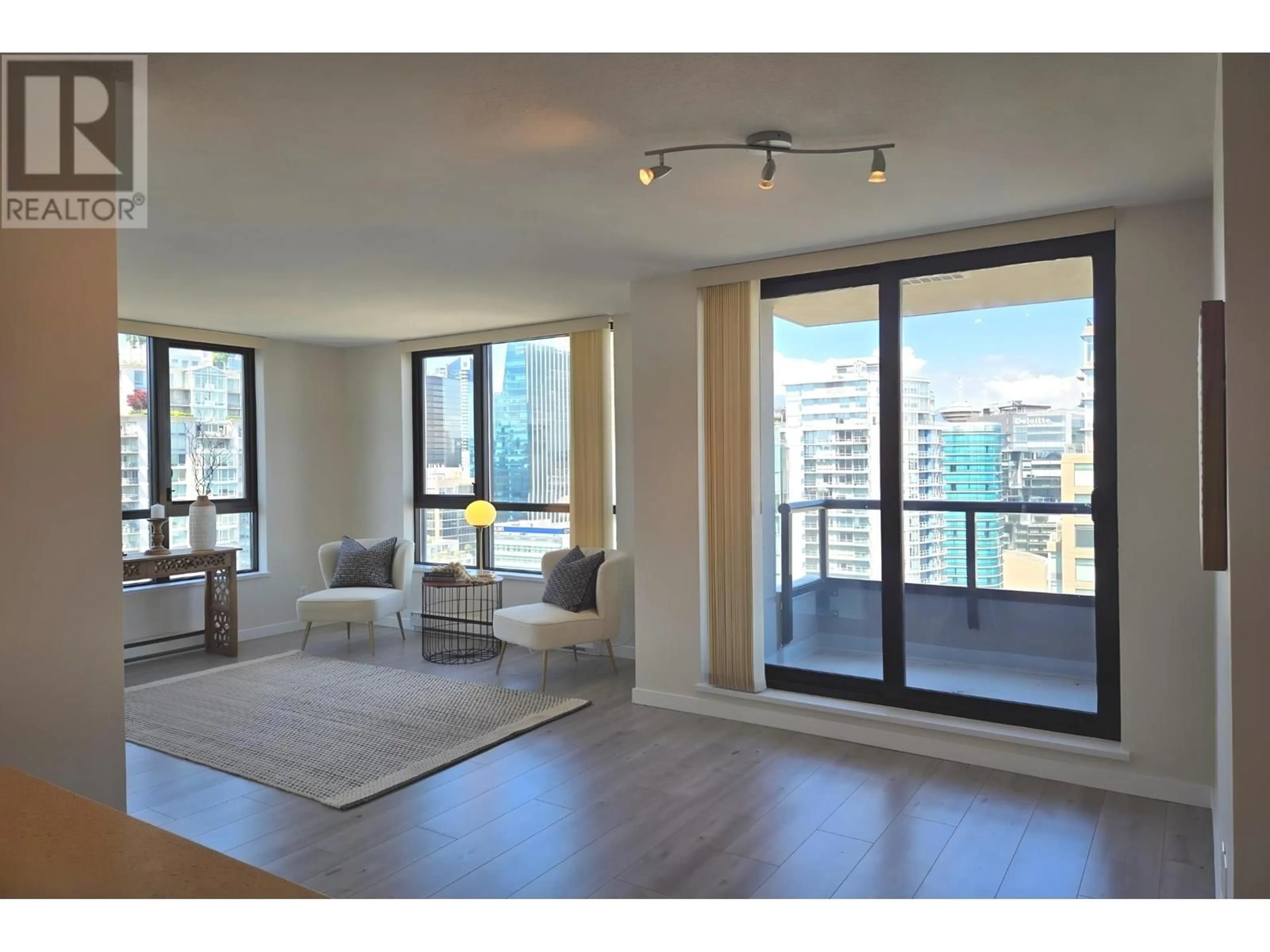Living room with furniture, wood/laminate floor for 3103 - 928 HOMER STREET, Vancouver British Columbia V6B1T7