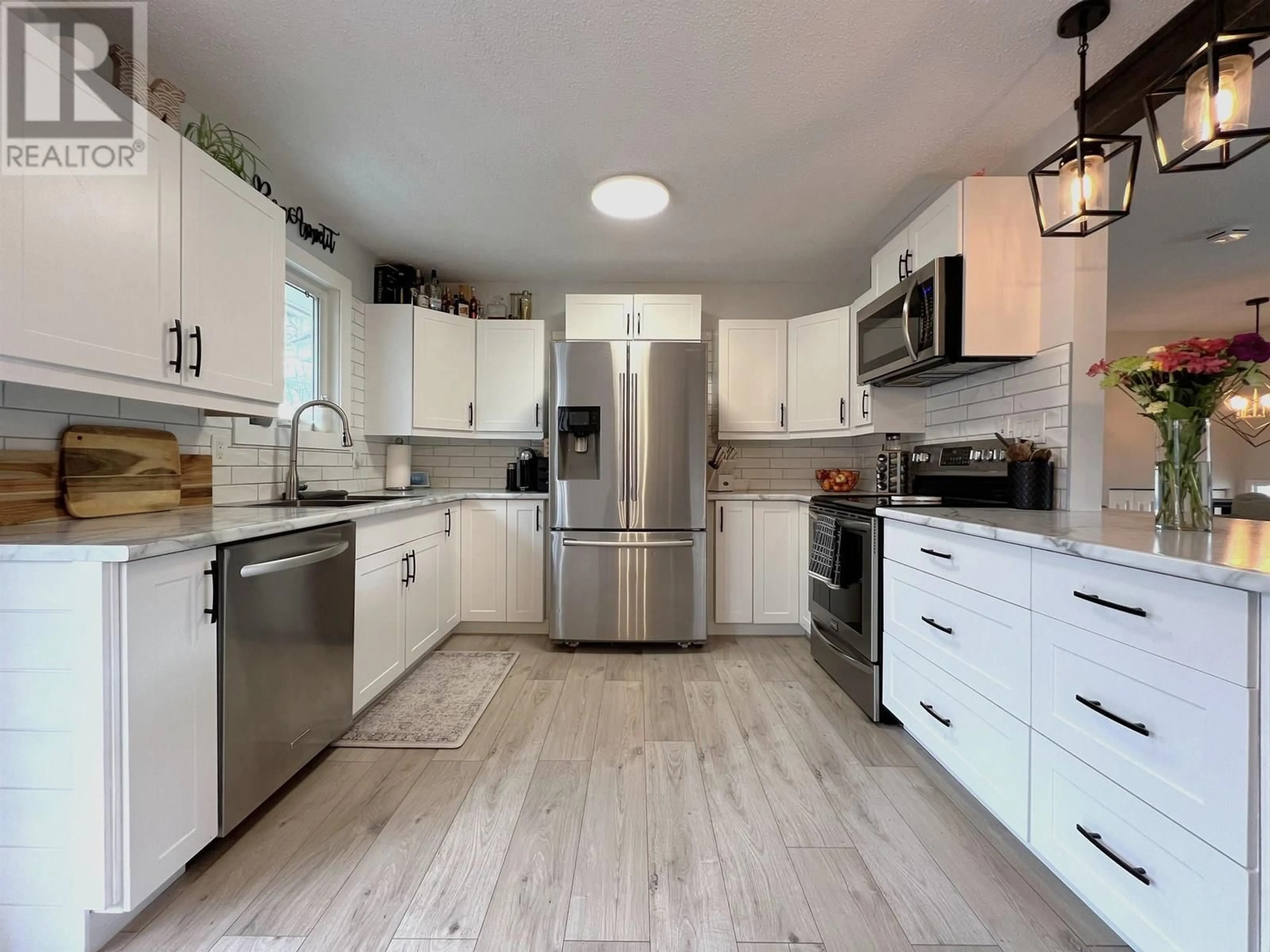 Open concept kitchen, ceramic/tile floor for 5764 OXFORD DRIVE, Prince George British Columbia V2N2E6