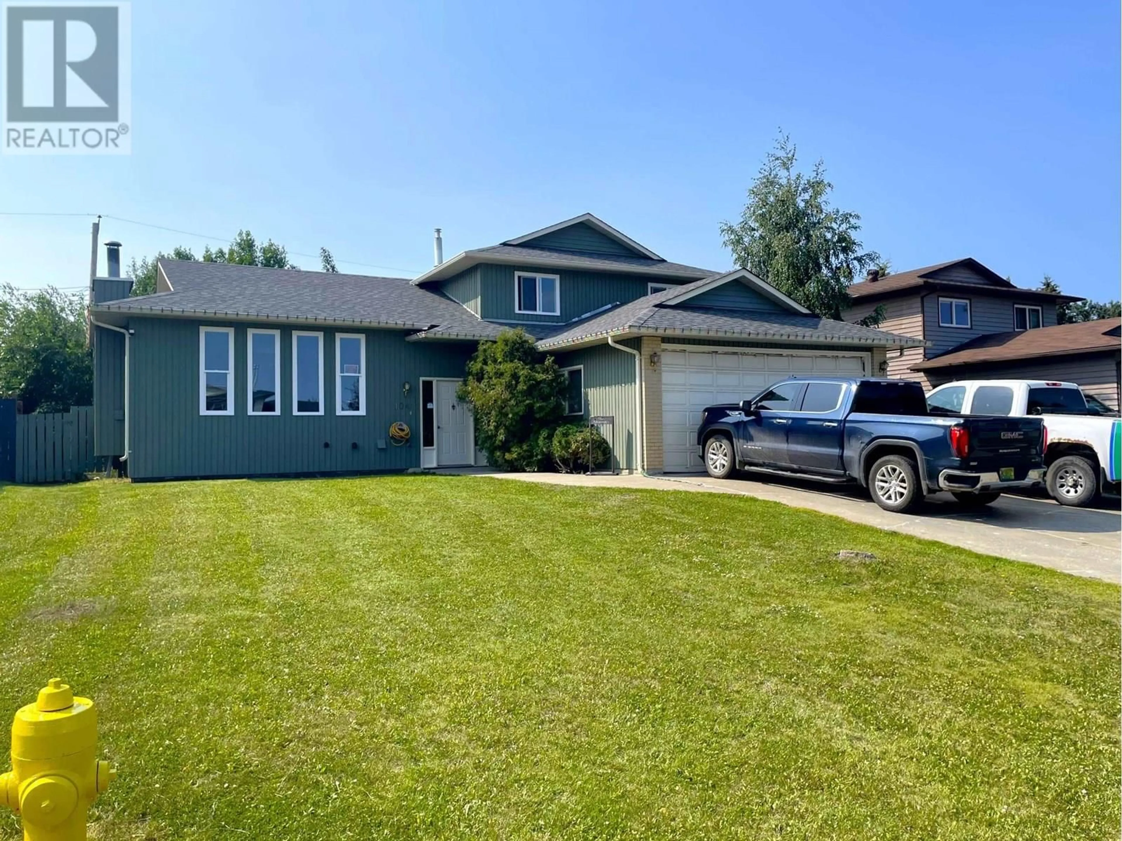 A pic from outside/outdoor area/front of a property/back of a property/a pic from drone, street for 10411 113 AVENUE, Fort St. John British Columbia V1J6C5