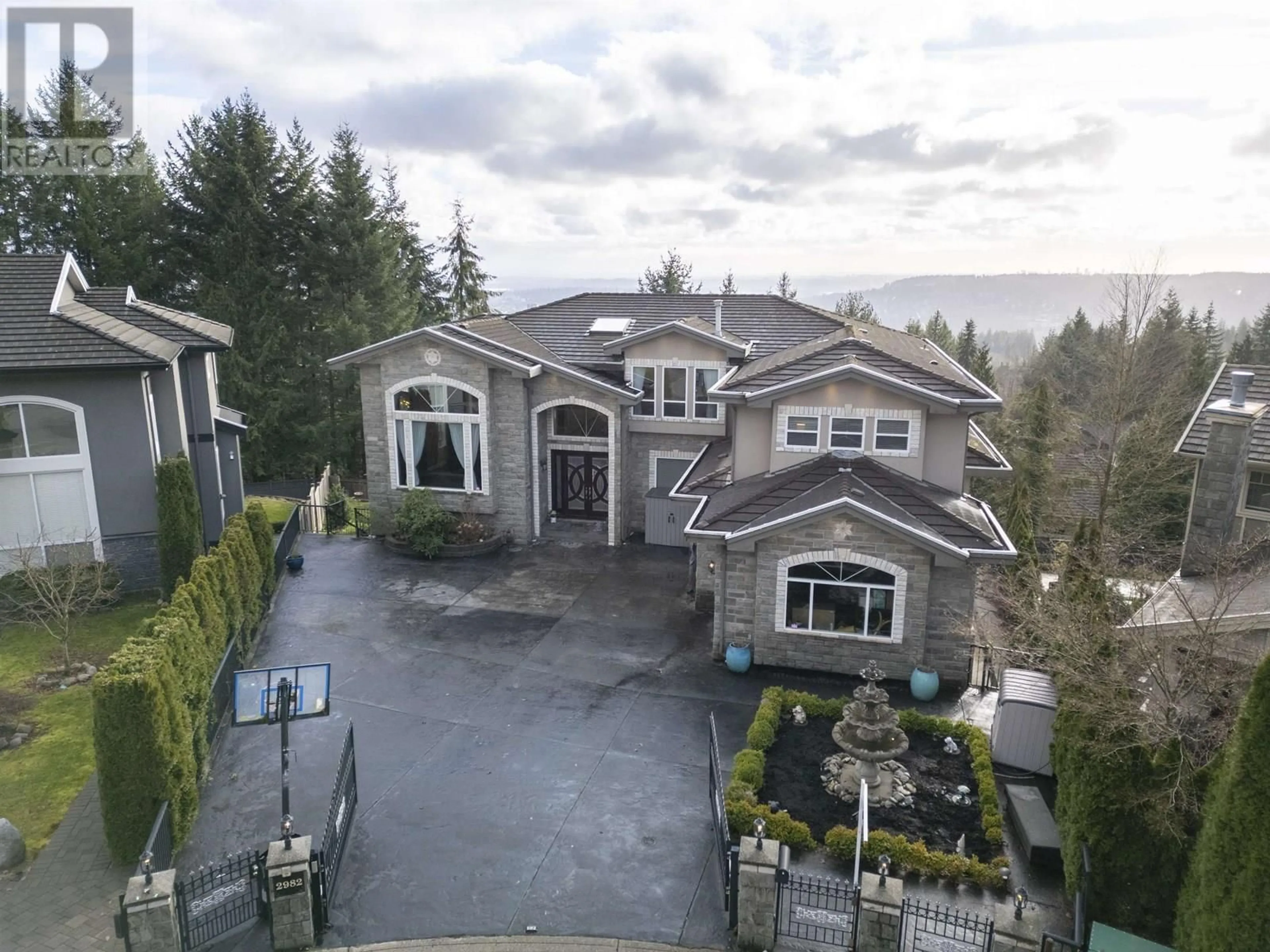 A pic from outside/outdoor area/front of a property/back of a property/a pic from drone, mountain view for 2982 SUNRIDGE COURT, Coquitlam British Columbia V3E3M5