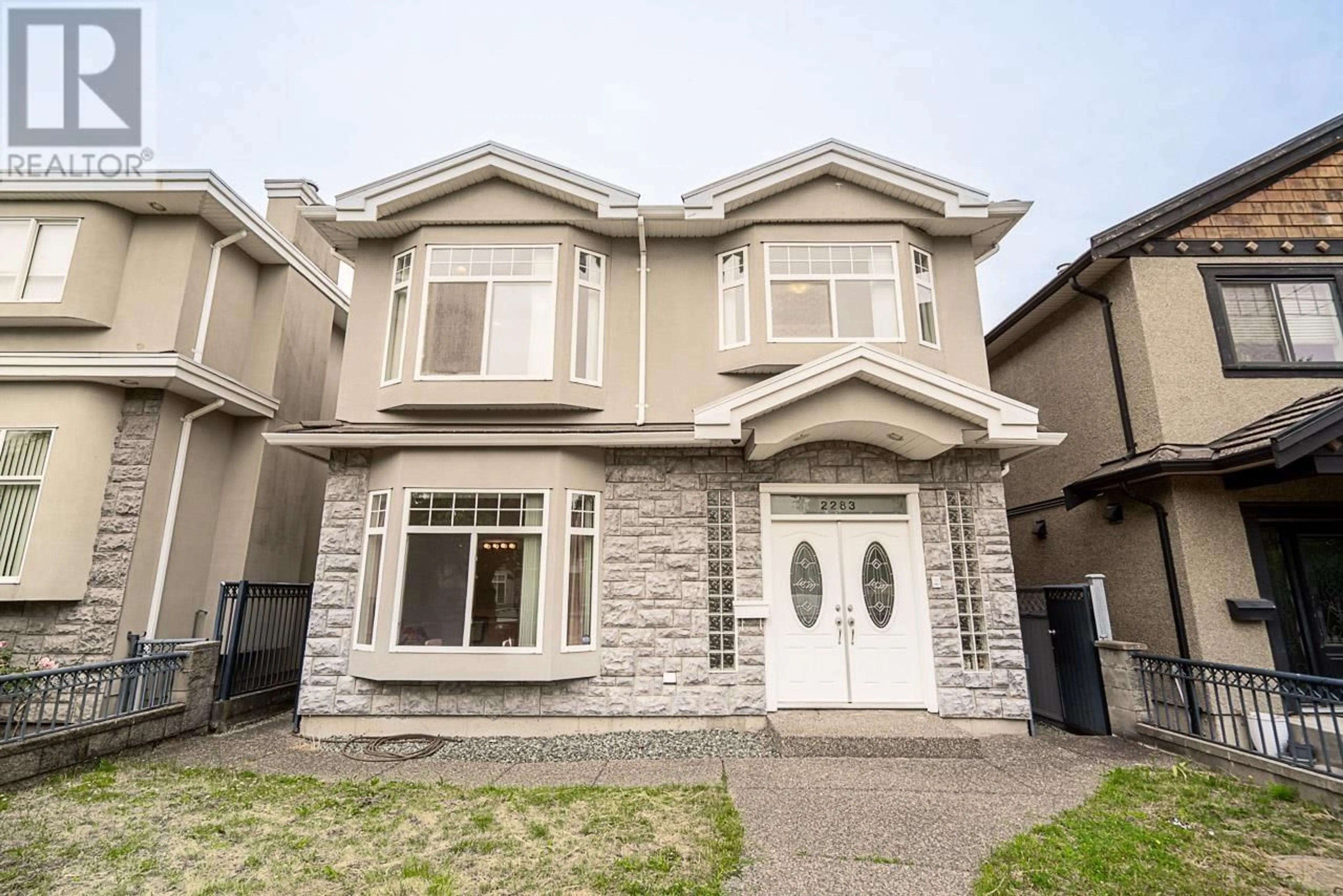 Home with vinyl exterior material, street for 2283 48TH AVENUE, Vancouver British Columbia V5P1R9