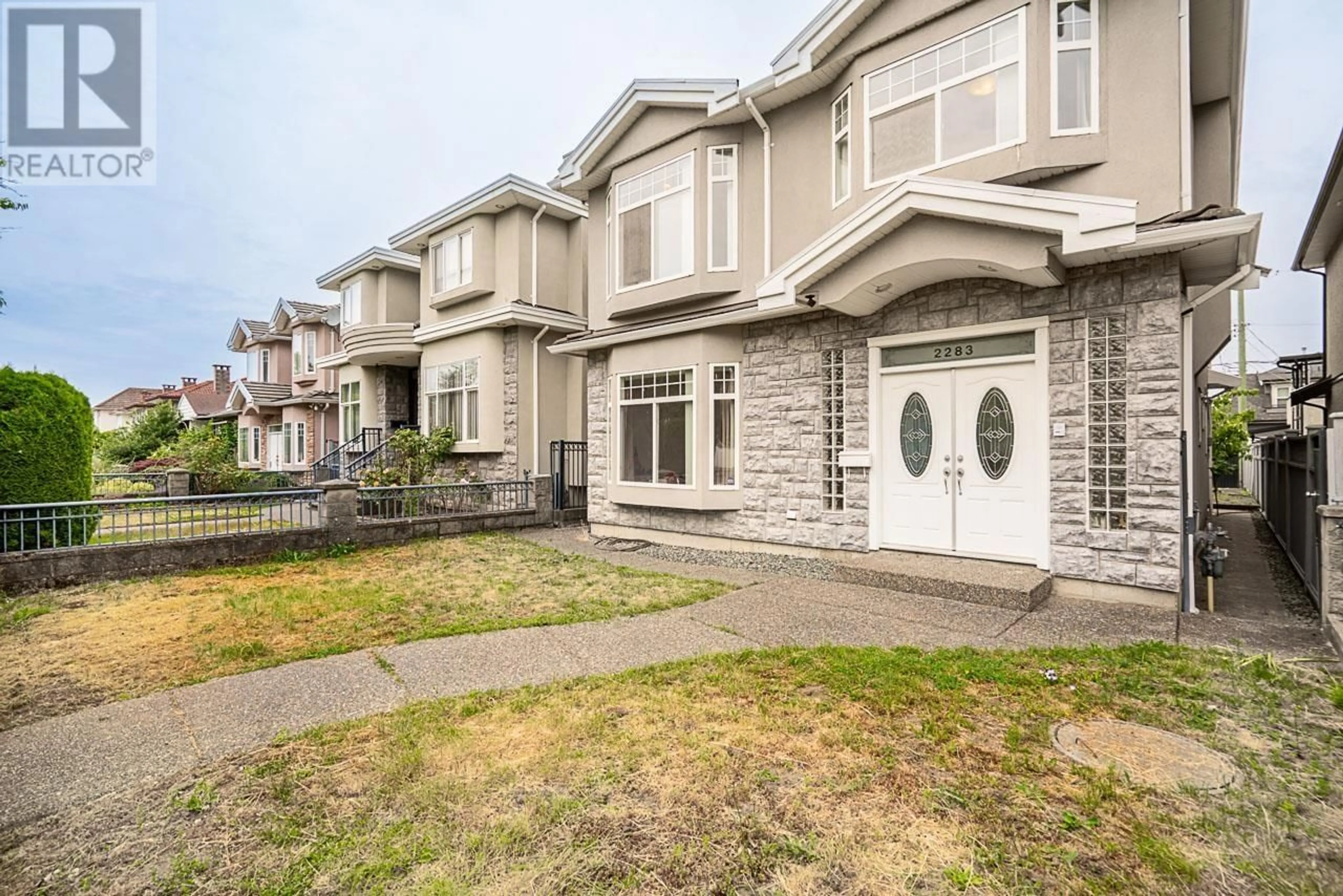 Home with vinyl exterior material, street for 2283 48TH AVENUE, Vancouver British Columbia V5P1R9