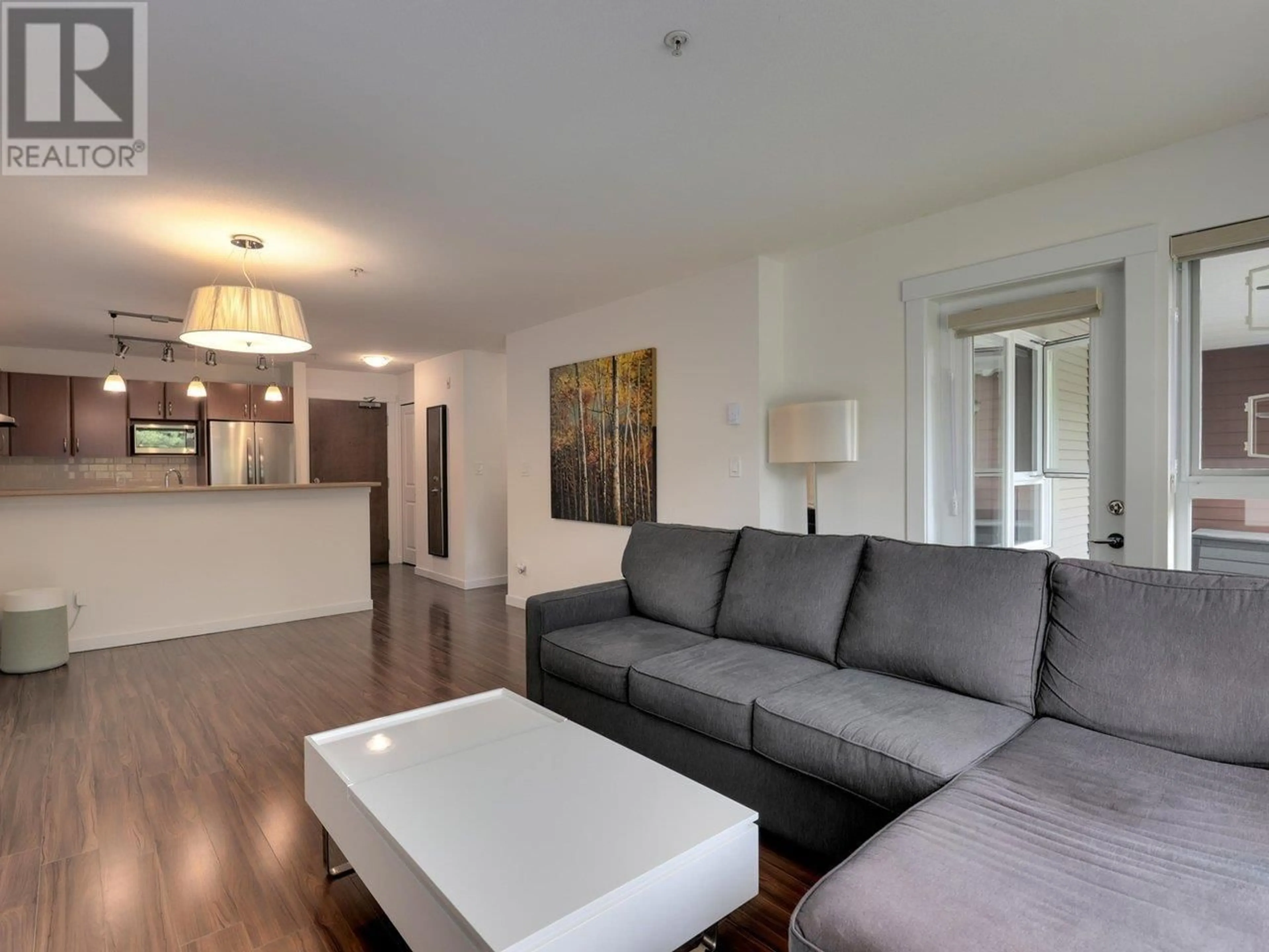 Living room with furniture, wood/laminate floor for 303 - 4783 DAWSON STREET, Burnaby British Columbia V5C0A8