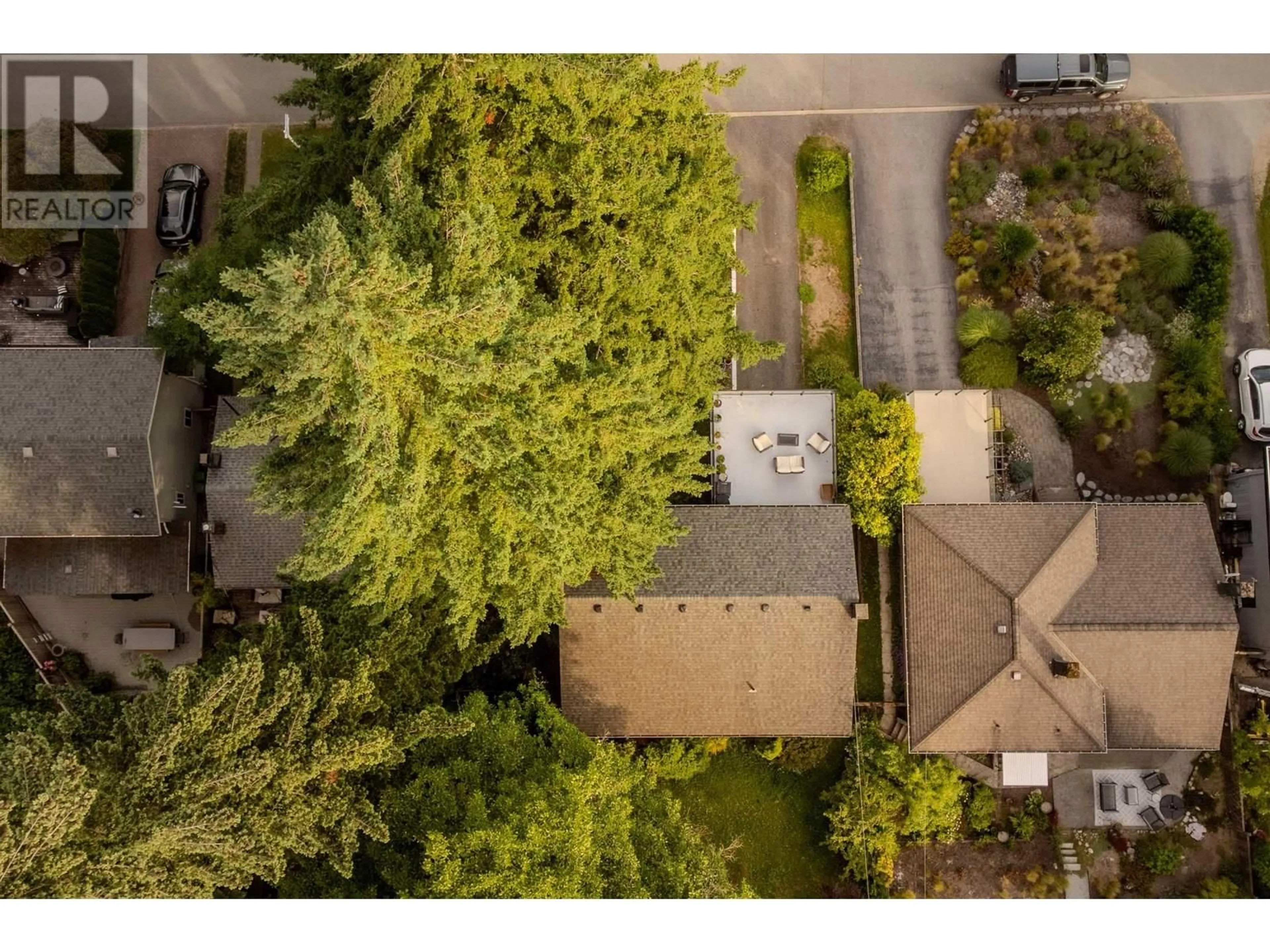 A pic from outside/outdoor area/front of a property/back of a property/a pic from drone, forest/trees view for 1082 CALVERHALL STREET, North Vancouver British Columbia V7L1Y3