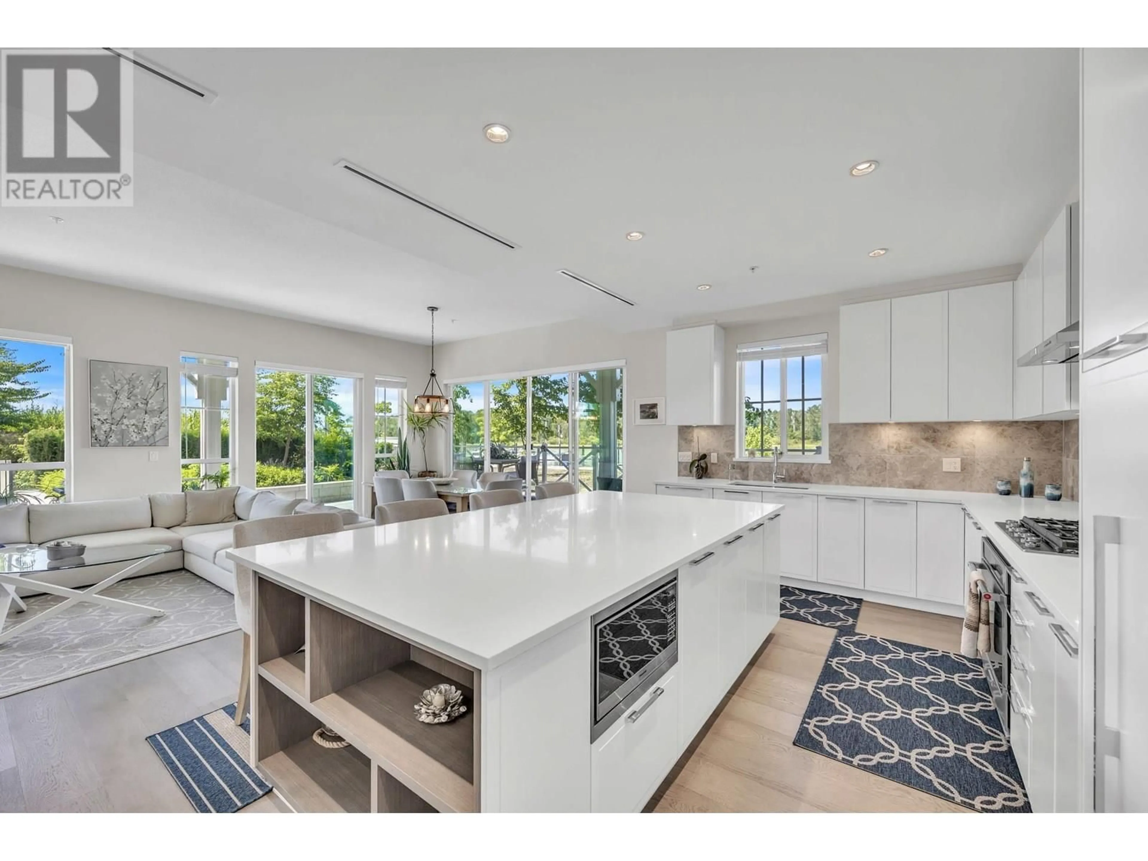 Open concept kitchen, ceramic/tile floor for 107 - 5535 ADMIRAL WAY, Delta British Columbia V4K0E3
