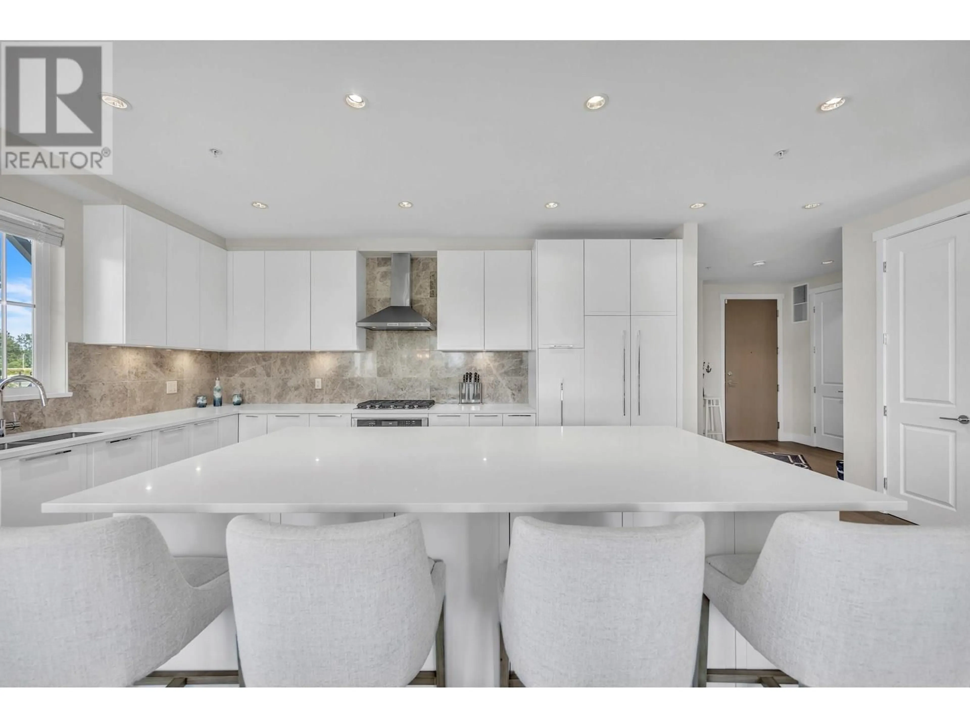 Open concept kitchen, ceramic/tile floor for 107 - 5535 ADMIRAL WAY, Delta British Columbia V4K0E3